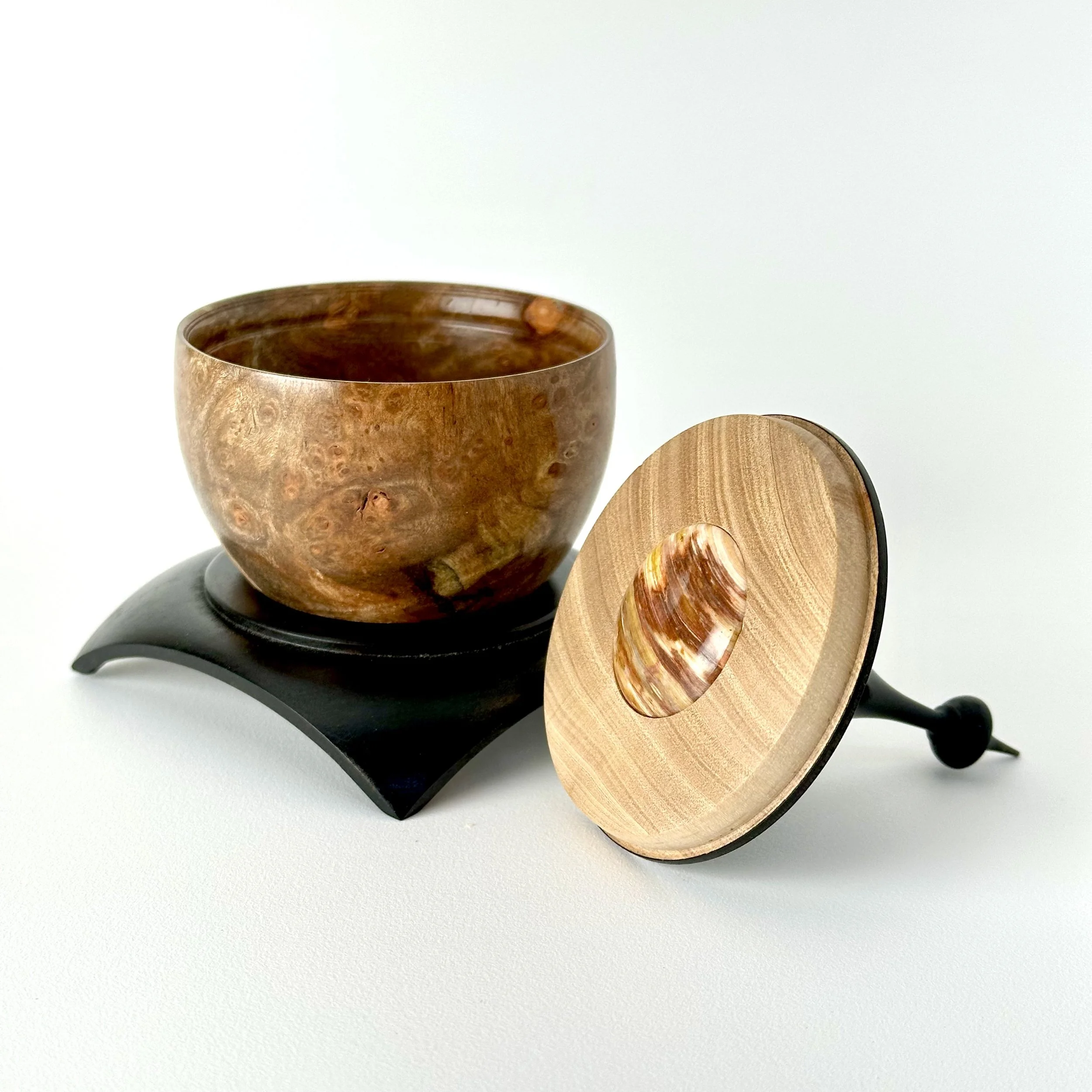 Wooden burl vessel with a jasper from the McDermitt caldera.