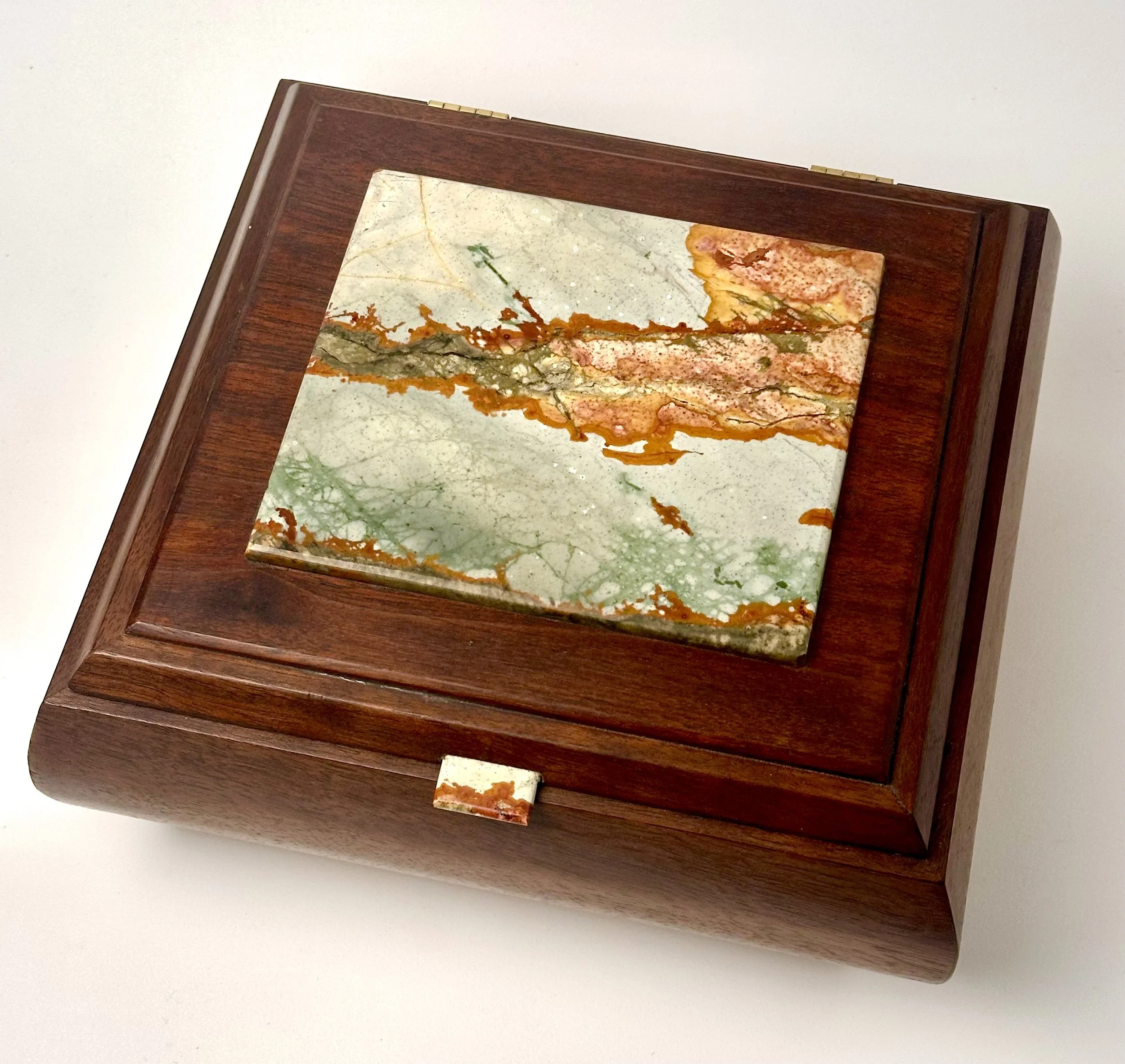 

Walnut and Blue Mustang picture jasper. 10” x 9” x 3.5”