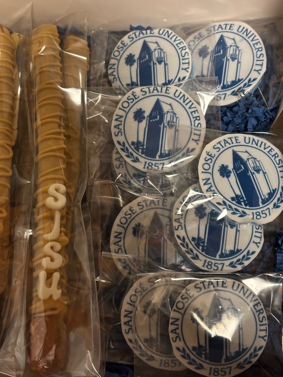 Cookies with San Jose State University logo and keychain candy sticks with university name