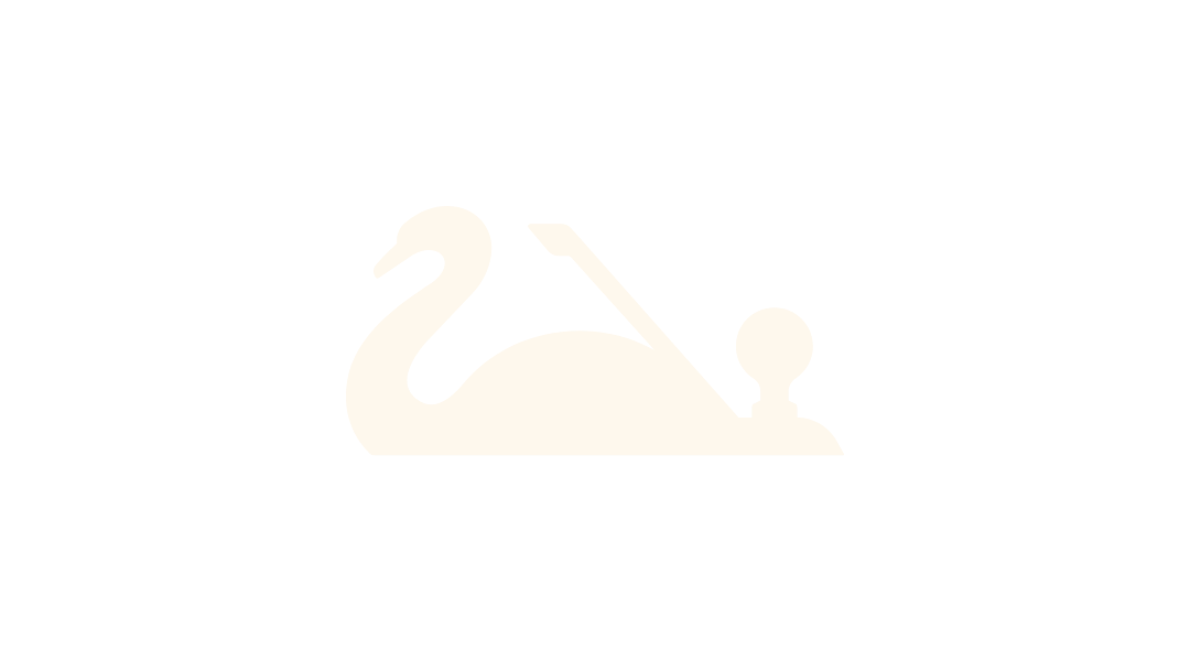 Silhouette of a swan boat with a paddle and a ball in front