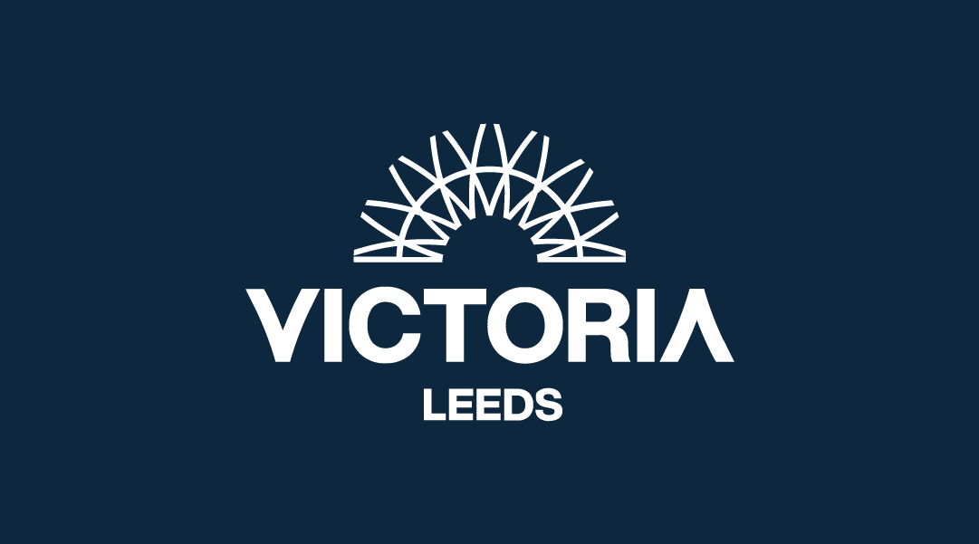 Victoria Leeds logo with a stylized arch design above the word 'Victoria' and 'Leeds' below on a dark blue background.