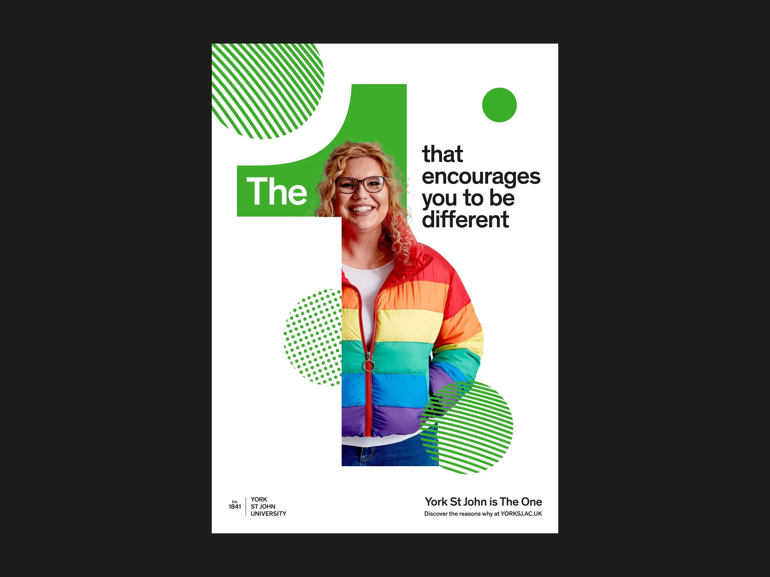 A colorful university recruitment poster featuring a smiling woman in a rainbow-striped jacket, with green geometric accents and the slogan 'The one that encourages you to be different.' The poster mentions York St John University and provides a website for more information.