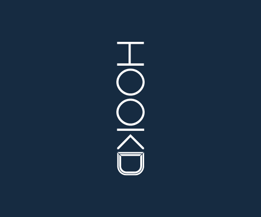 Vertical logo with the word 'HOOKD' on a dark background. Home print company.