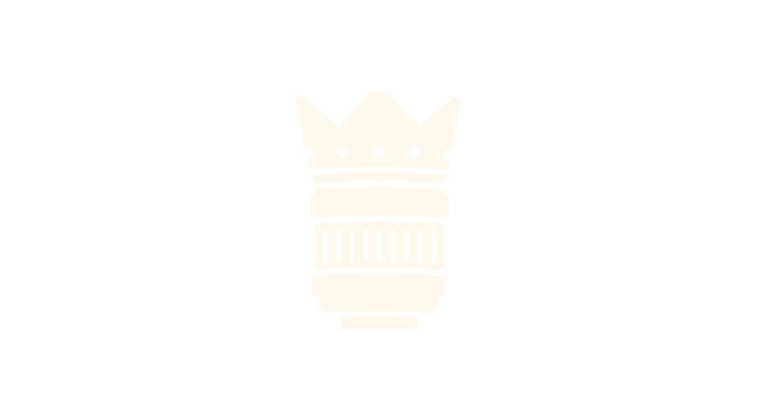 Camera lens with a white crown logo on it.