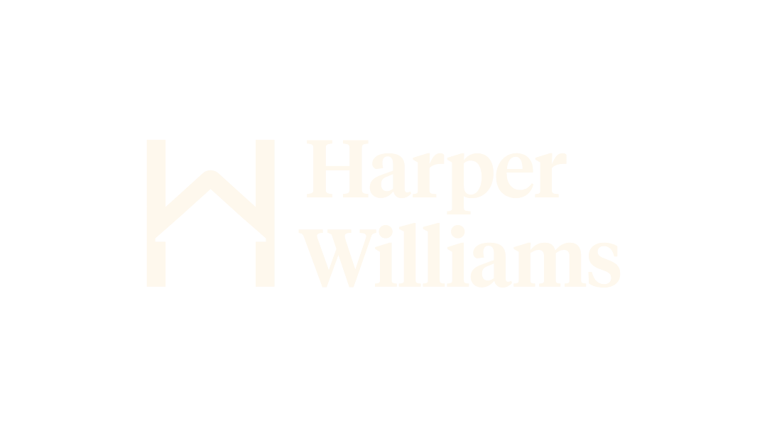 Logo for Harper Williams with a stylized 'H' that incorporates a house roof design in black and white.