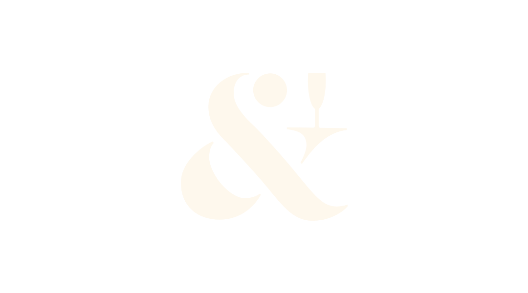 Stylized white ampersand and exclamation mark on a black background.