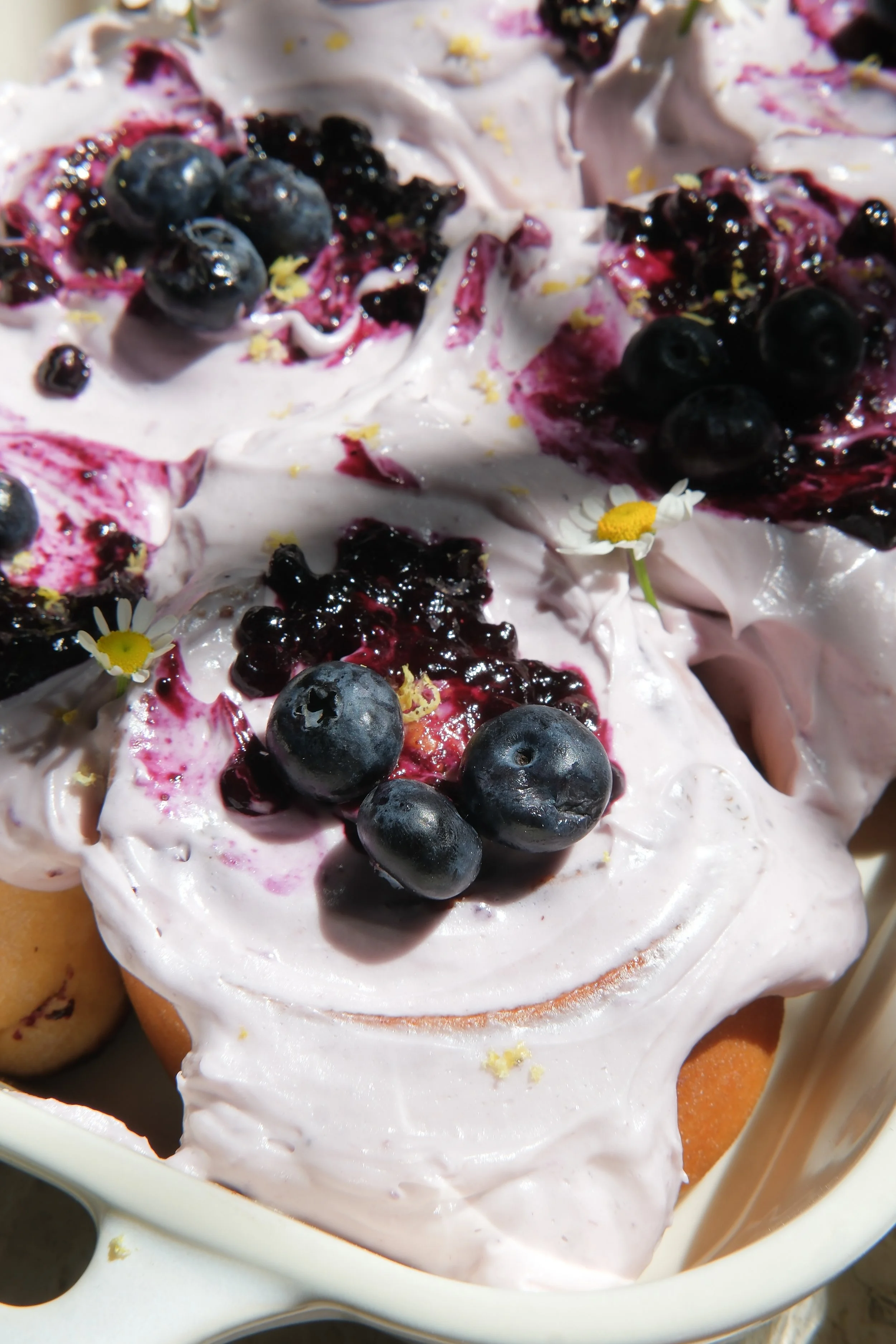 Blueberry Cinnamon Rolls Layered With A Jammy Blueberry Lemon Frosting