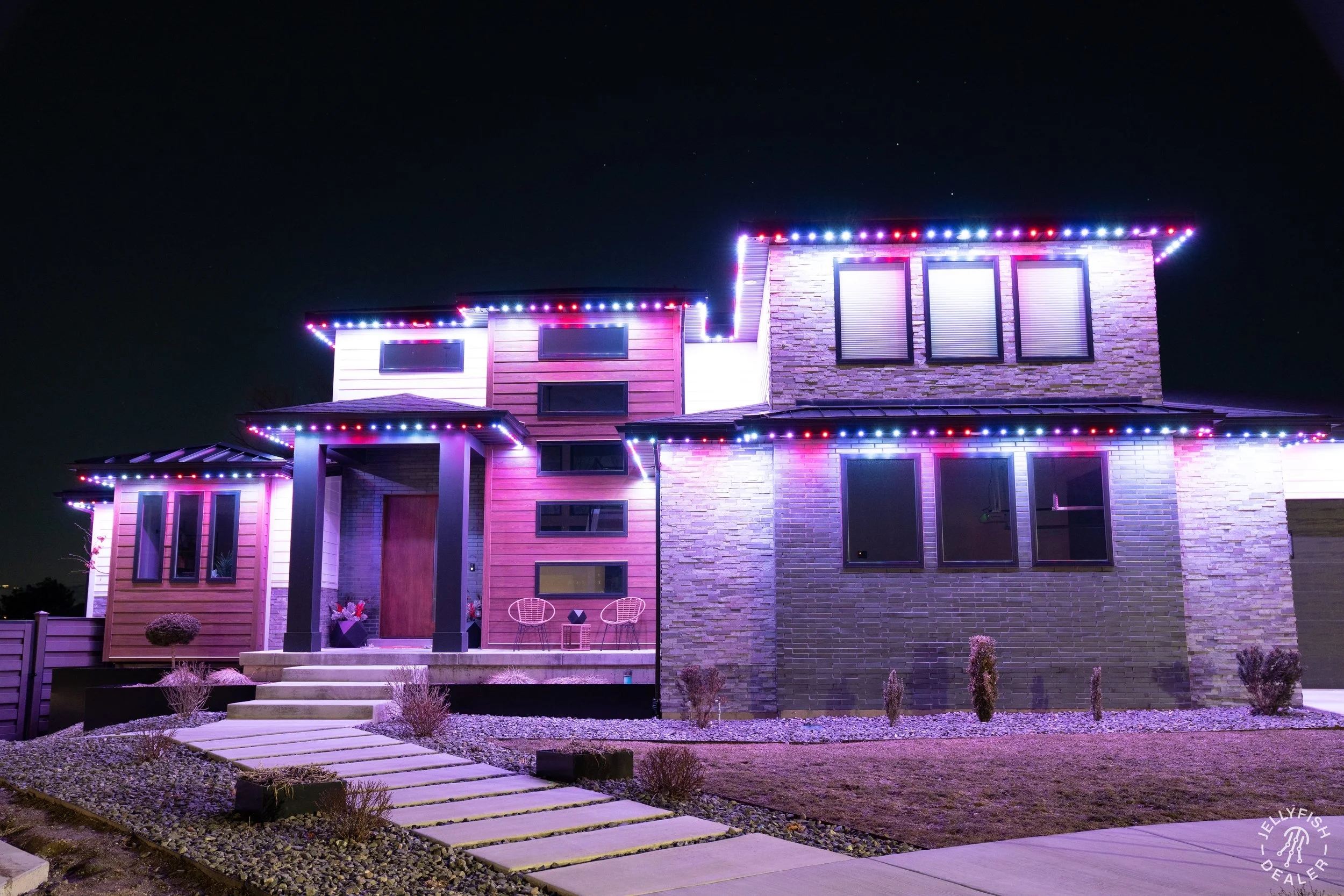 Multi-level roofline coverage with independent zone control for custom holiday lighting patterns.