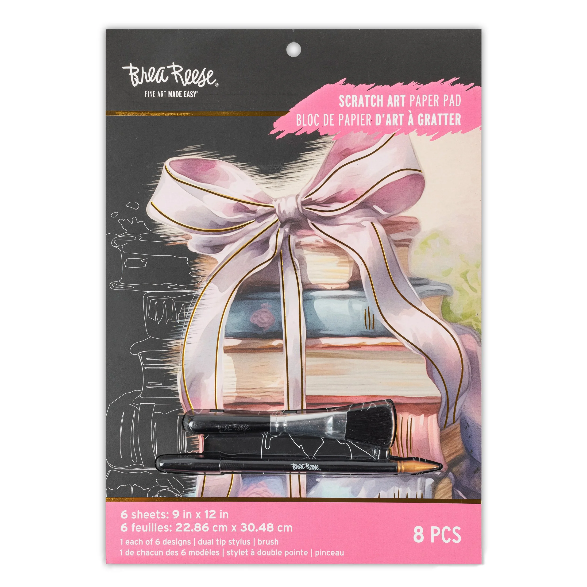 Packaged set of eight scratch art paper sheets with a decorative sunset, books, and ribbon illustration on the packaging. Contains a dual-tip stylus/brush for creating scratch art designs.