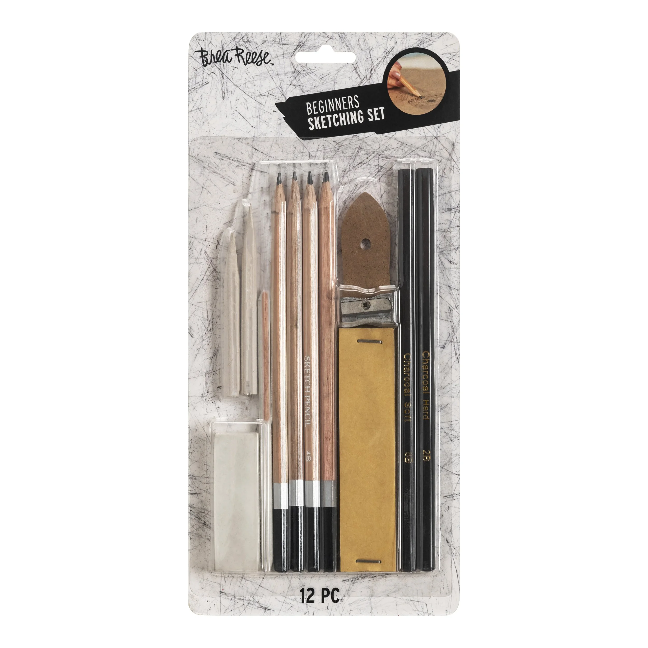 Beginners sketching set containing pencils, charcoal sticks, eraser, sharpener, sandpaper block, and a cutting tool, all in a plastic case.