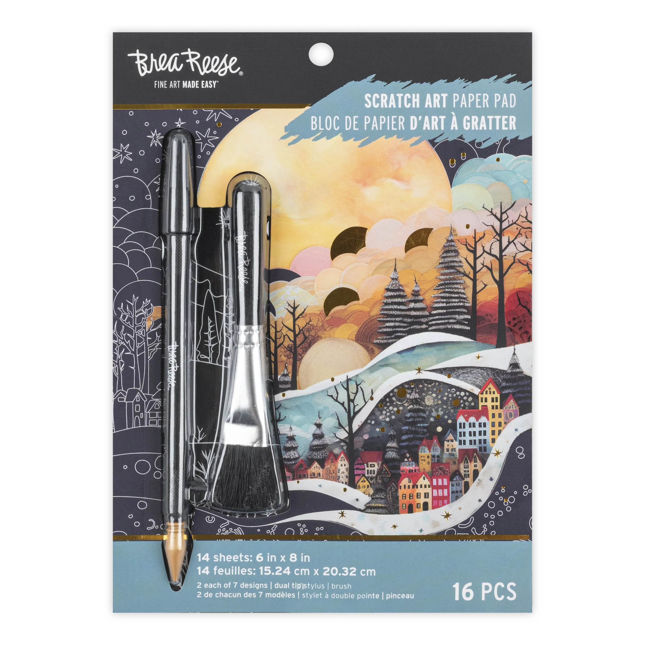 Package of scrap art paper pads featuring two black pens and a pocket knife on the front. The background shows a colorful illustrated winter scene with houses, trees, snow, and a large yellow moon.