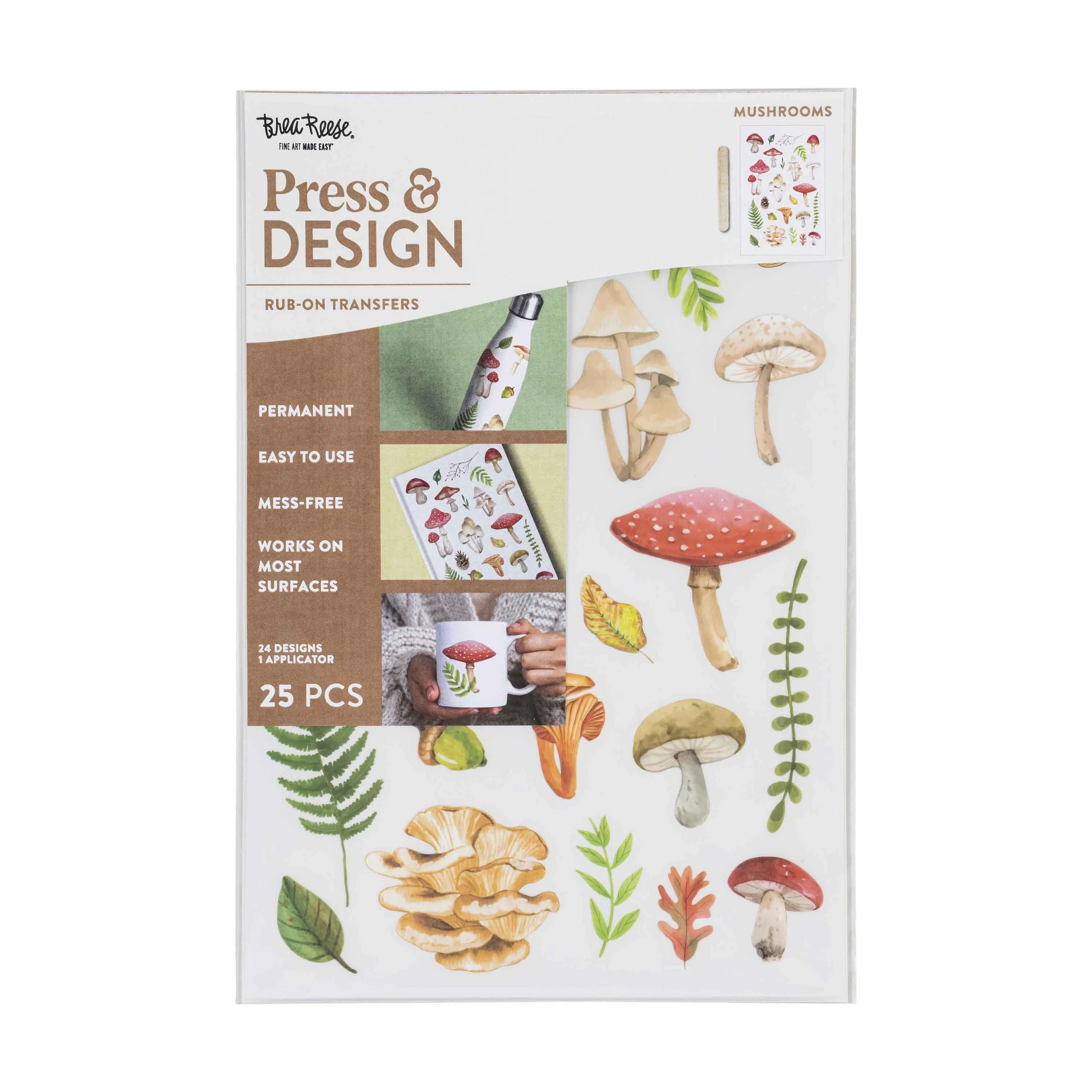 A package of mushroom-themed press and design rub-on transfers, featuring illustrations of various mushrooms, leaves, and fern plants.