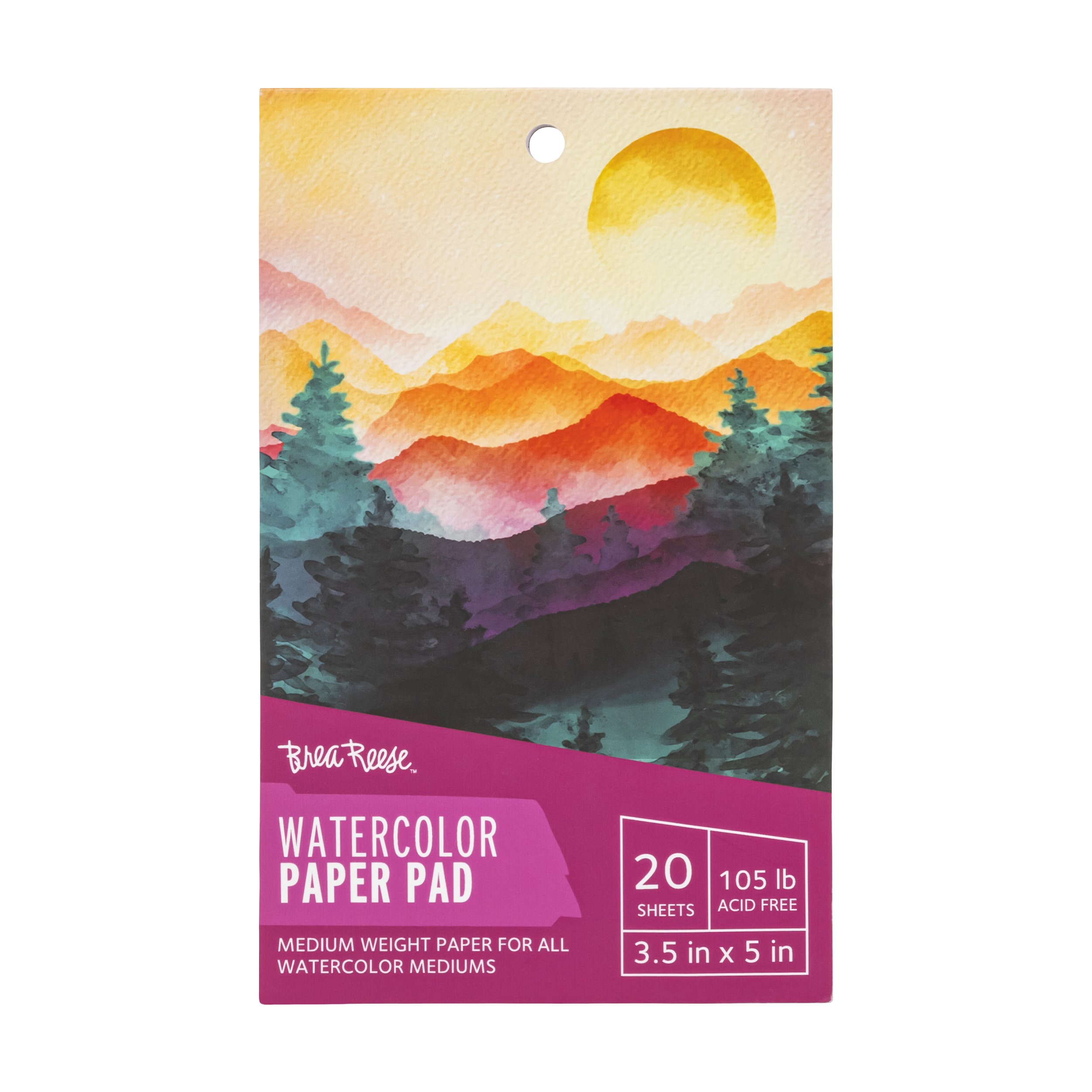 Watercolor paper pad featuring a landscape with colorful mountains, trees, and a sun.