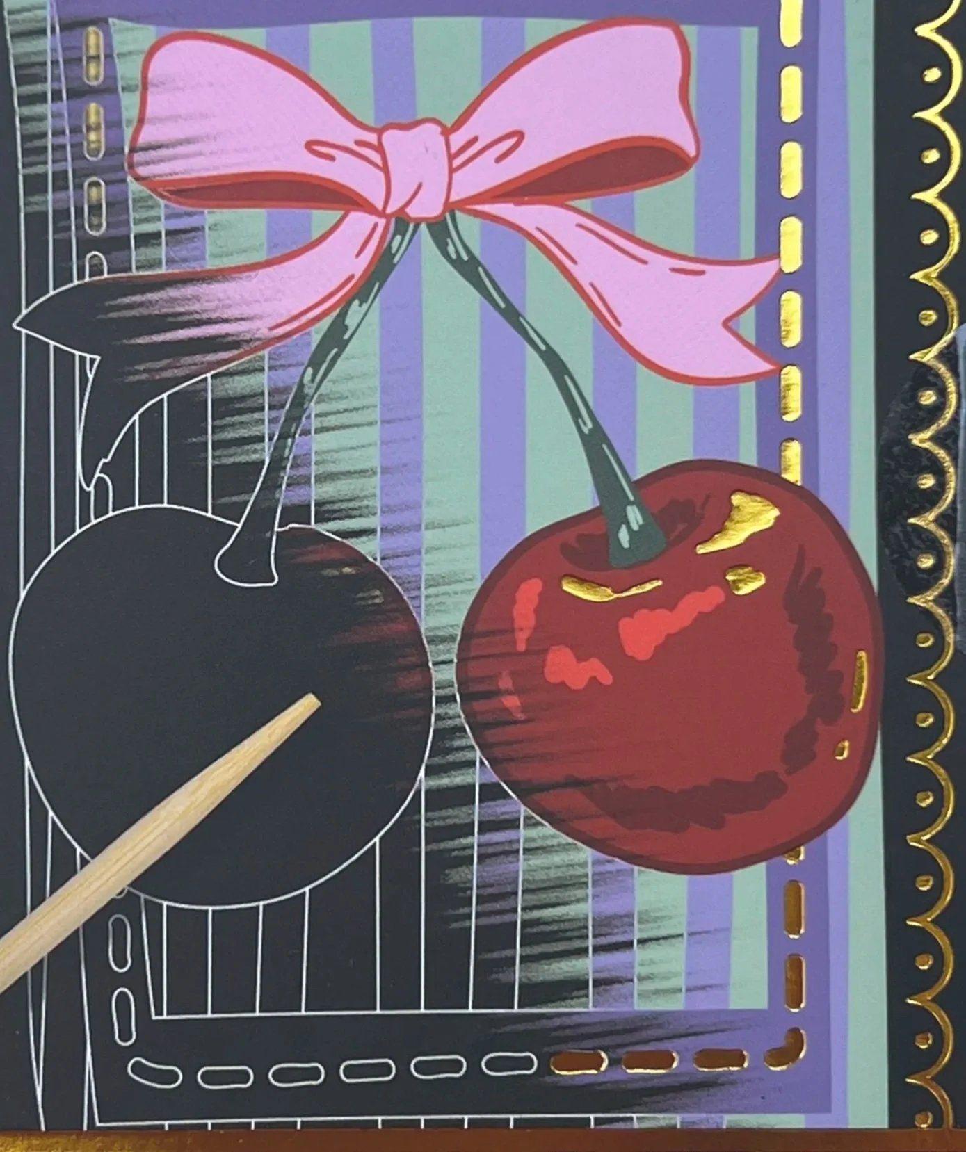 Colorful Vivid scratch art artwork of two cherries with a pink bow, one cherry is black and the other is red, with a painted background in striped purple and green, and a decorative gold foil border.