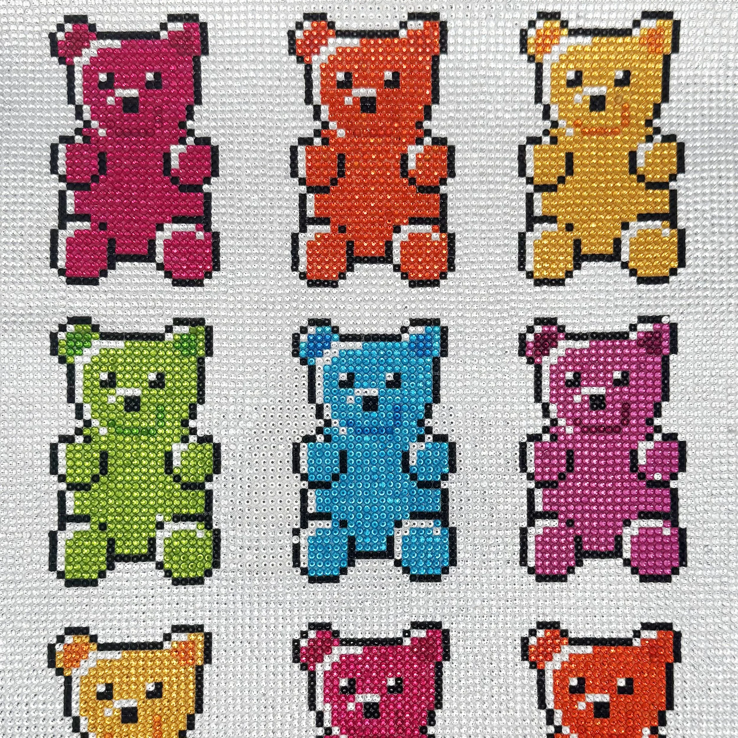 Arranged there are nine pixel art-style bears in different gem colors: pink, orange, yellow, green, blue, and purple, on a white background.