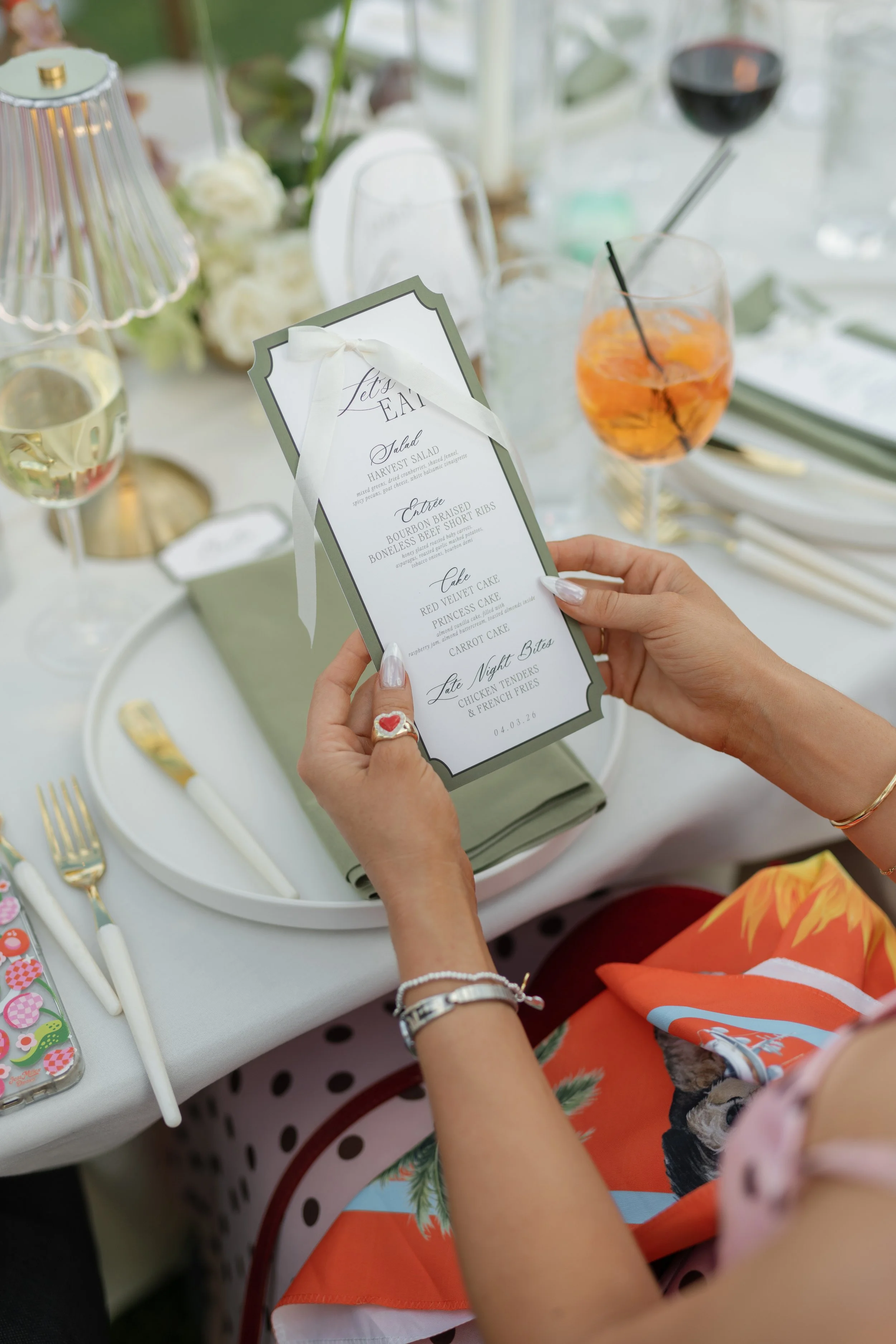 green and white menu with bow meal indicator