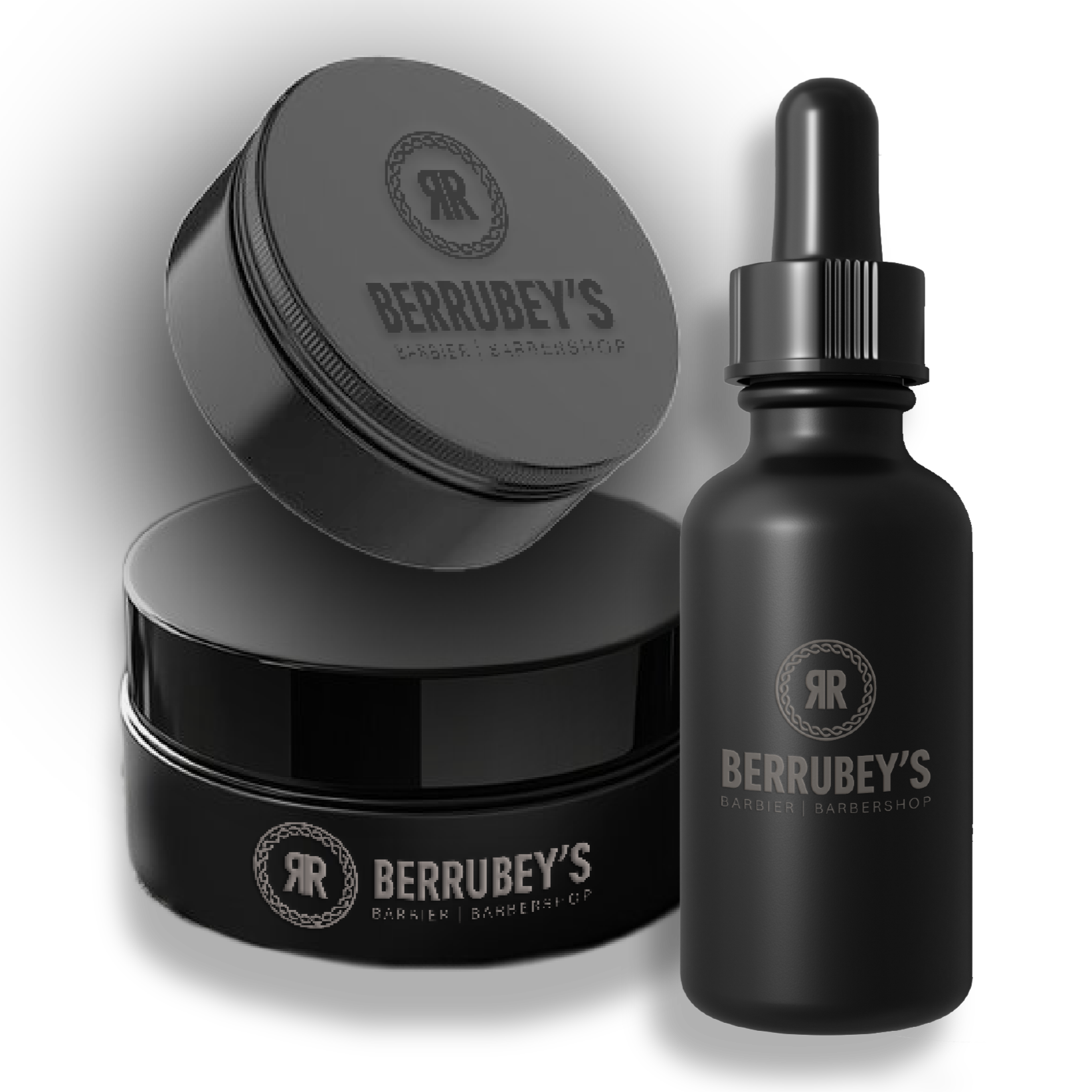 Produits de soin pour la barbe et les cheveux de la marque Berrubey's, notamment un pot de crème à raser, un savon à barbe et un flacon de soin ou huile à barbe, tous en emballage noir avec logo et texte en doré ou argenté sur fond noir.
