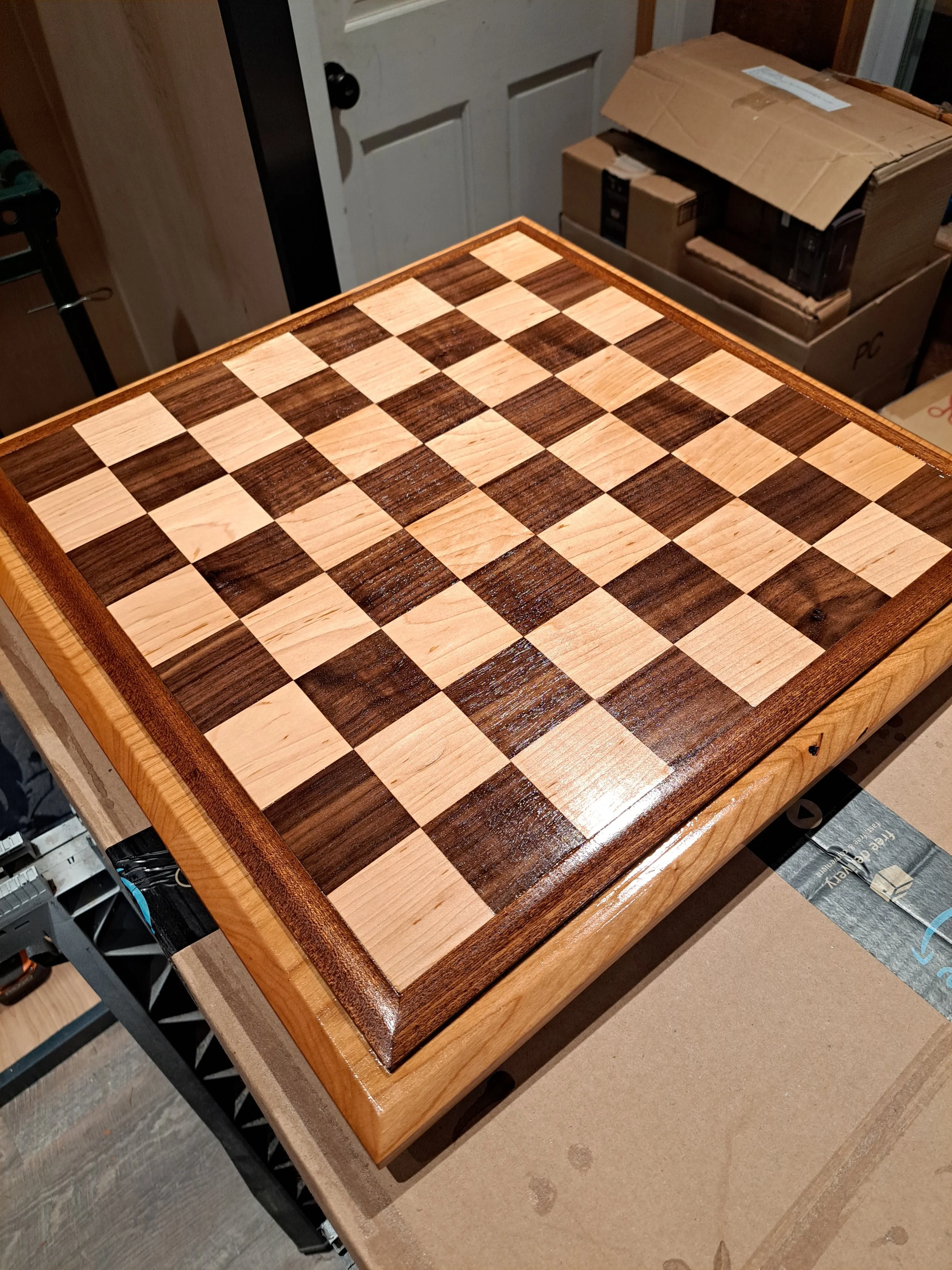 Chess board, made from maple & walnut squares, mahogany frame, and a cherry base