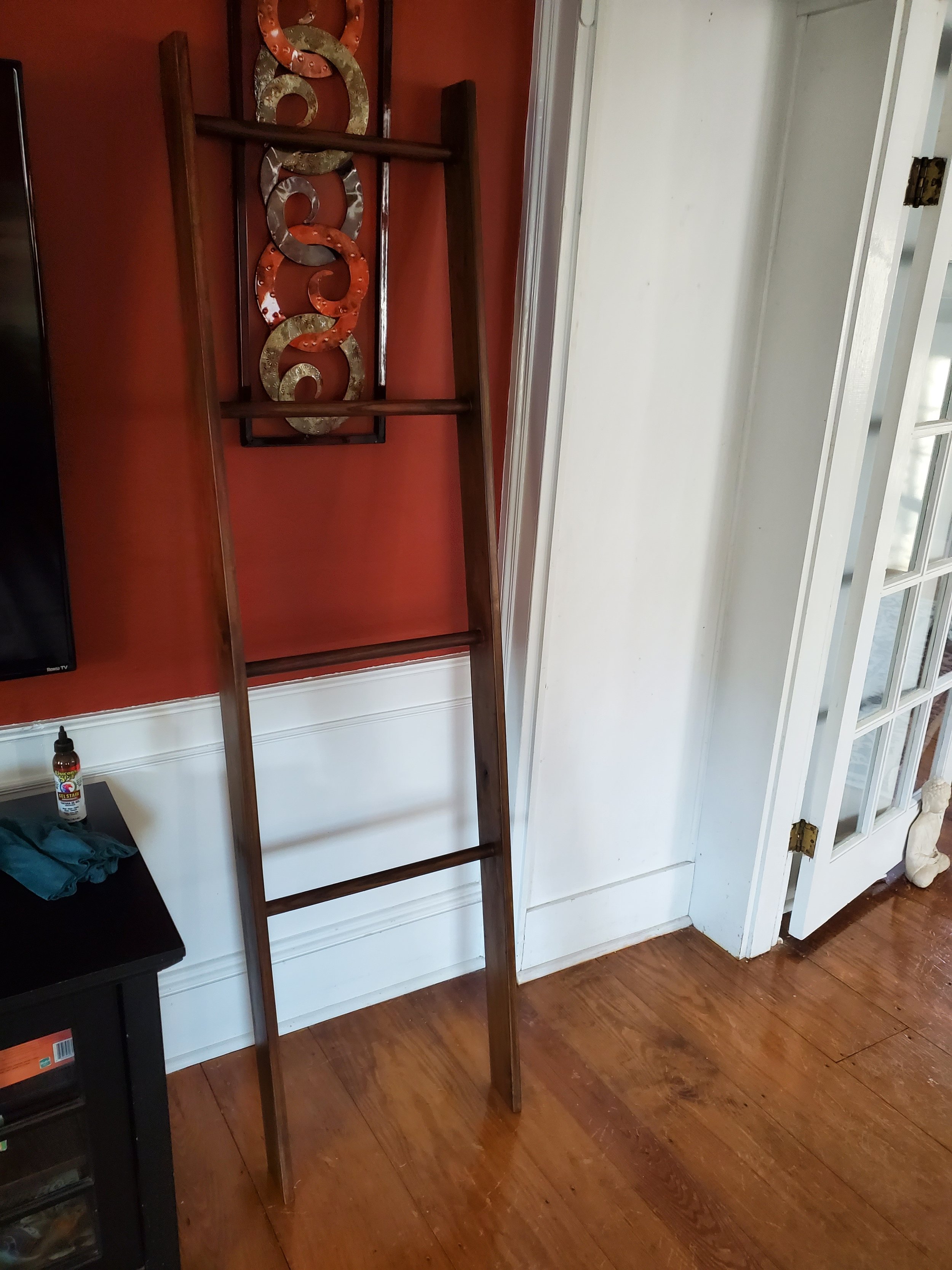 Ladder-style blanket rack, made from stained poplar