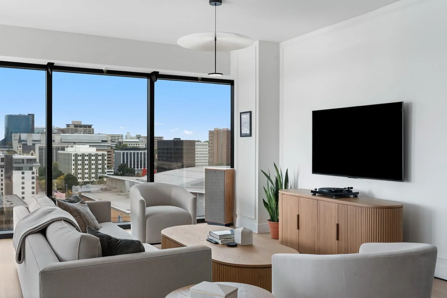 This home was too perfect, we just had to share more! Newly renovated by @anchor_rock_services, they took this high rise condo from an outdated mess to a modern dream with views of Grand Rapids from every room 😍✨