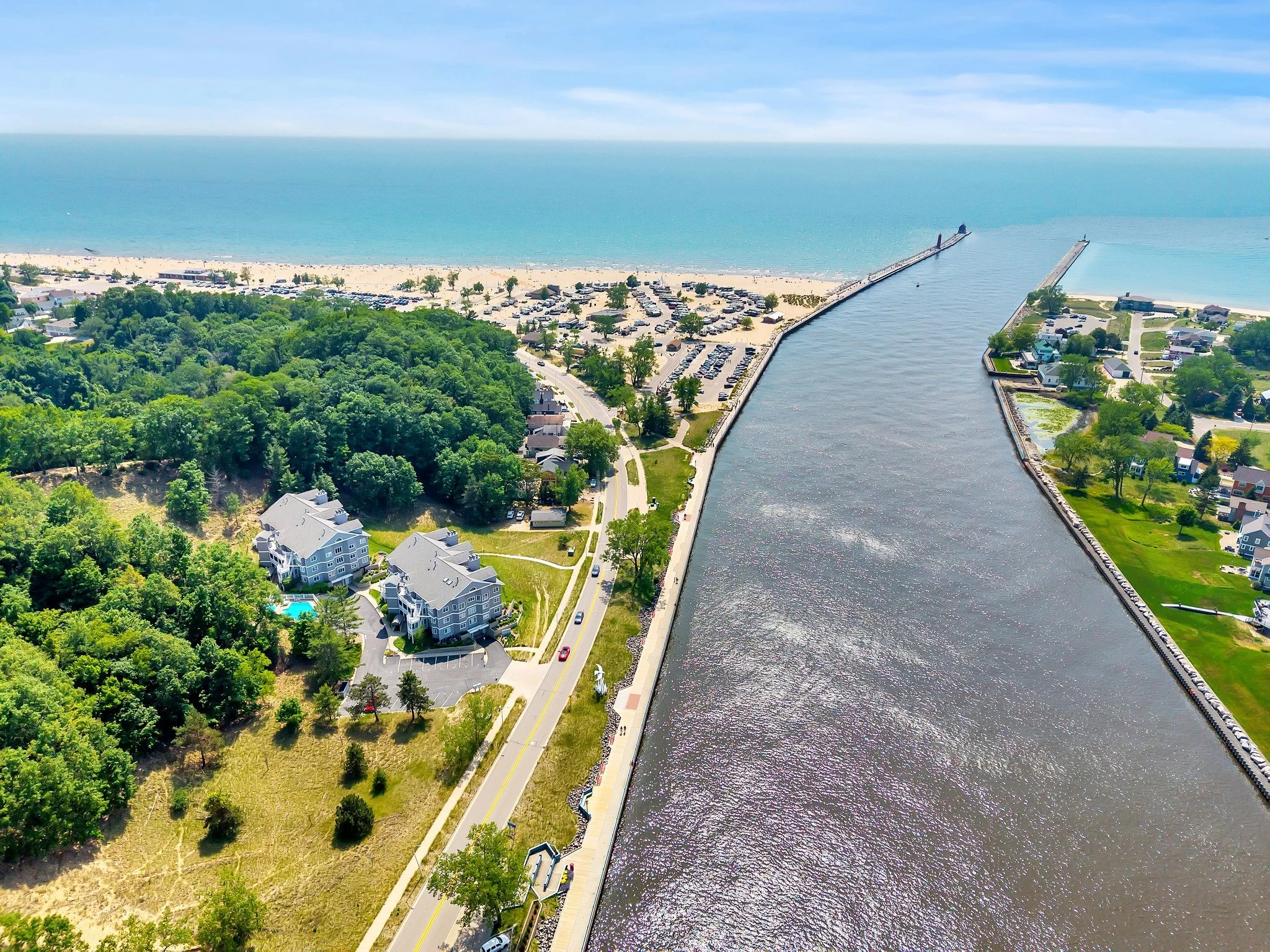 The best of Grand Haven living is right here! Imagine living in a luxurious condo, steps from the pier, with maintenance-free living and breathtaking Lake Michigan views.
