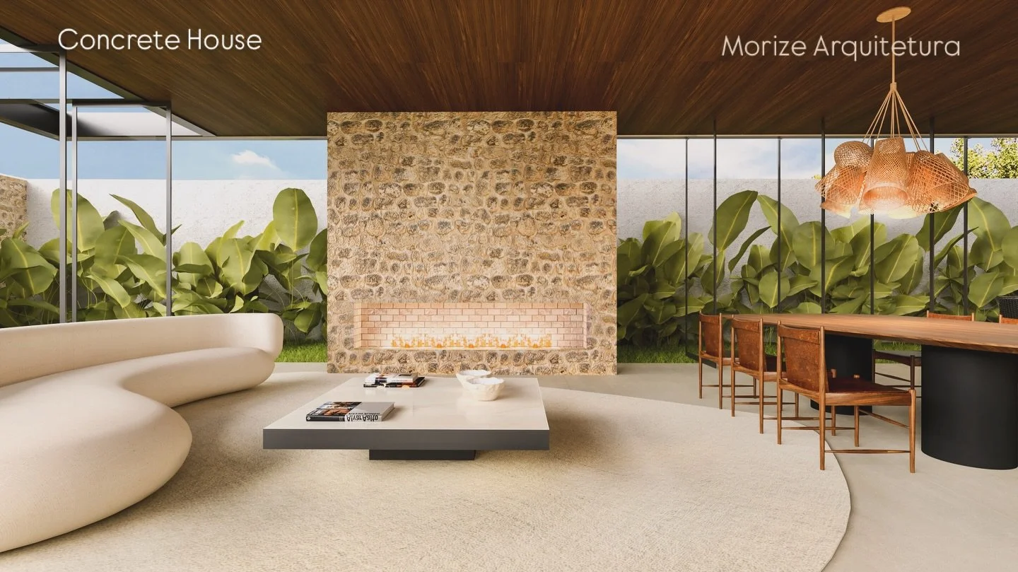 Concrete House 

A lareira em pedra bruta se torna o elemento central de aconchego, contrastando com o envidra&ccedil;amento pleno e a cobertura em madeira.#

O resultado &eacute; um espa&ccedil;o fluido, de luz suave e conforto t&eacute;rmico!

#arq