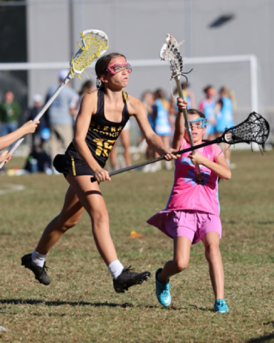 Girls lacrosse players in action during the Tenacity Super 6s Fall Tournament Olympic-style competition