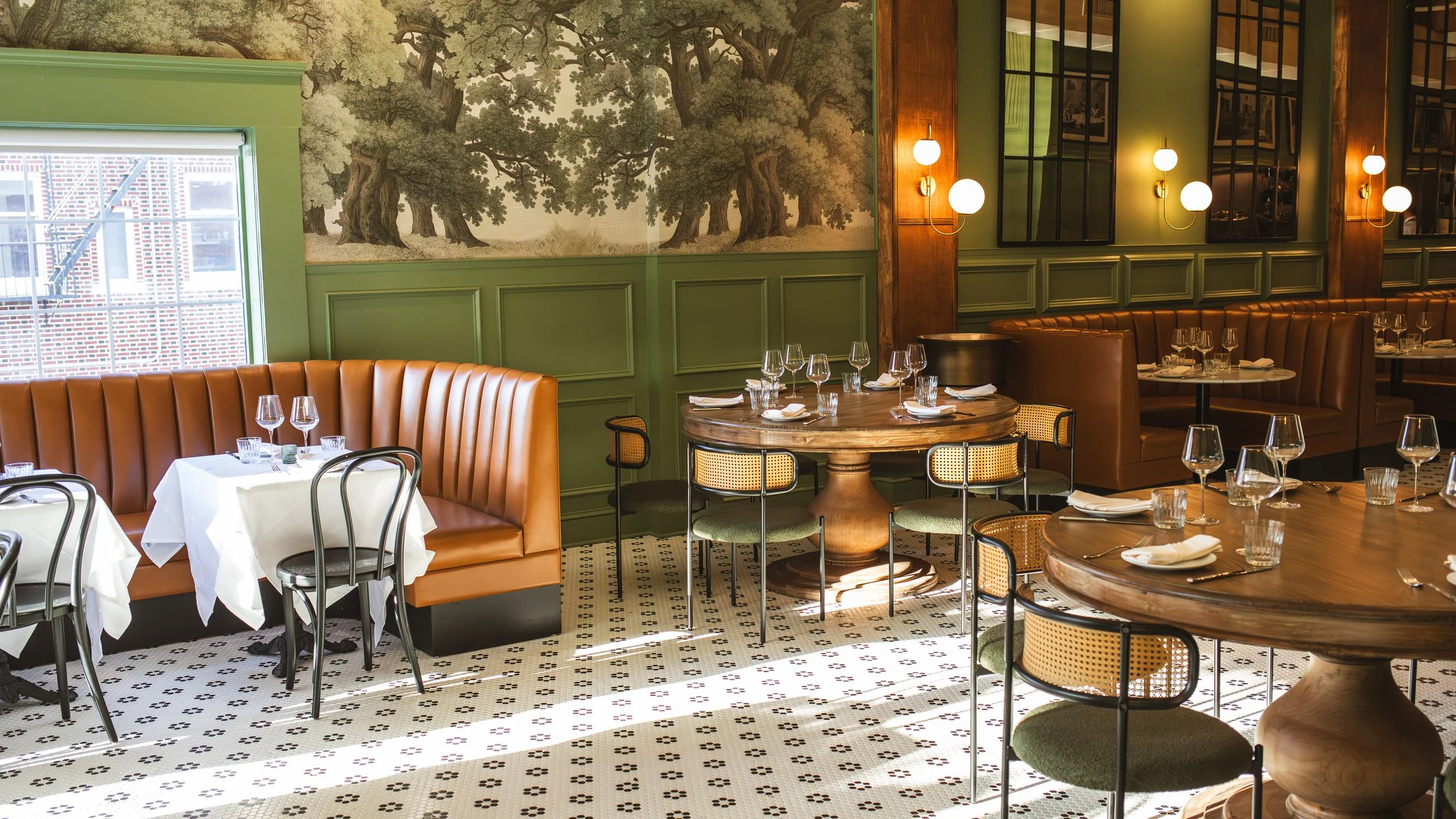 Cotto in Morristown blends cozy lighting, lively music, and vintage Italian photographs to create an elegant atmosphere perfect for intimate dinners or lively gatherings alongside elevated Italian cuisine.