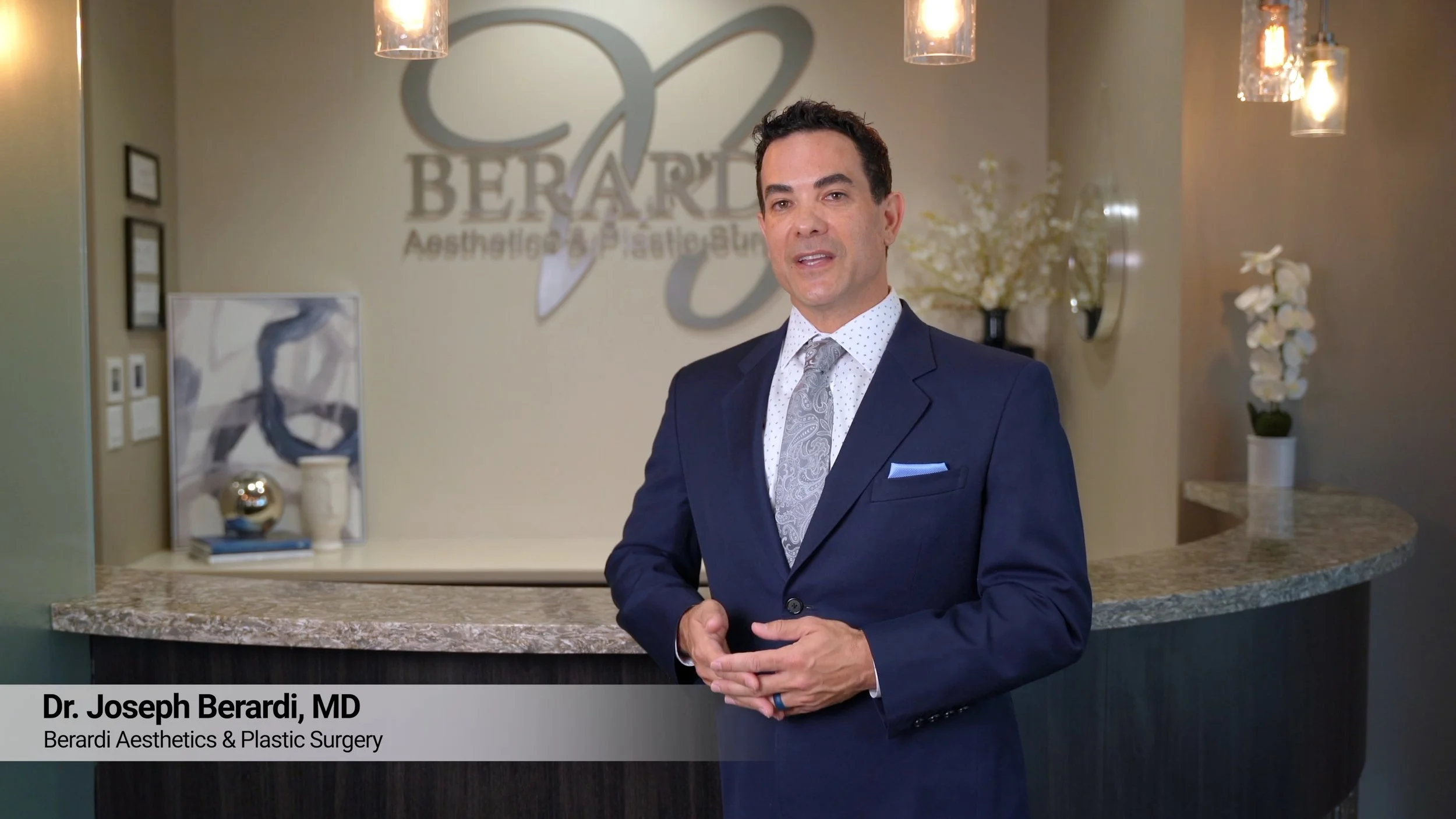 Plastic surgeon speaking on camera for a company introduction video in Mesa, Arizona