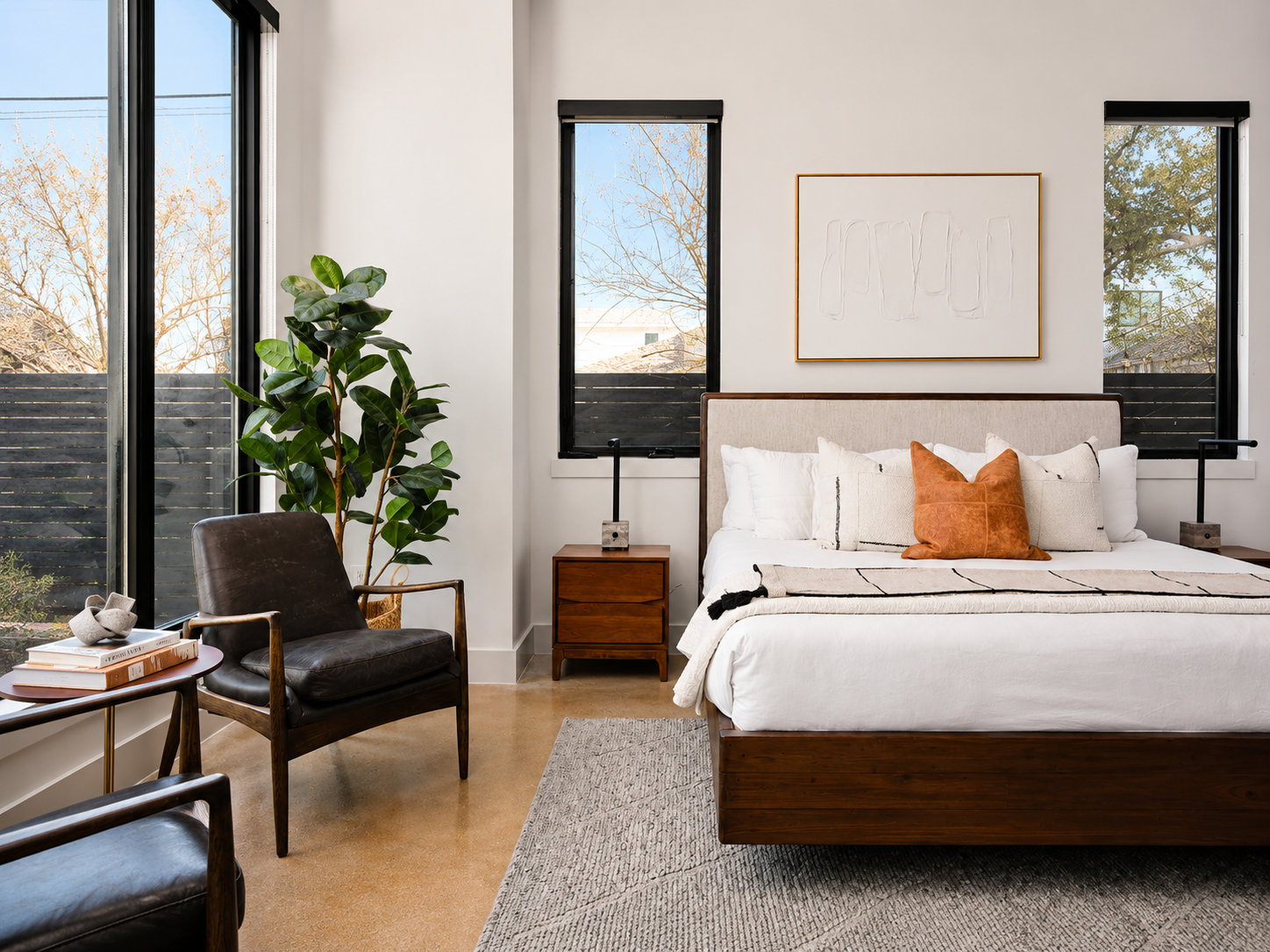 Anita St. minimalist bedroom with natural light.png