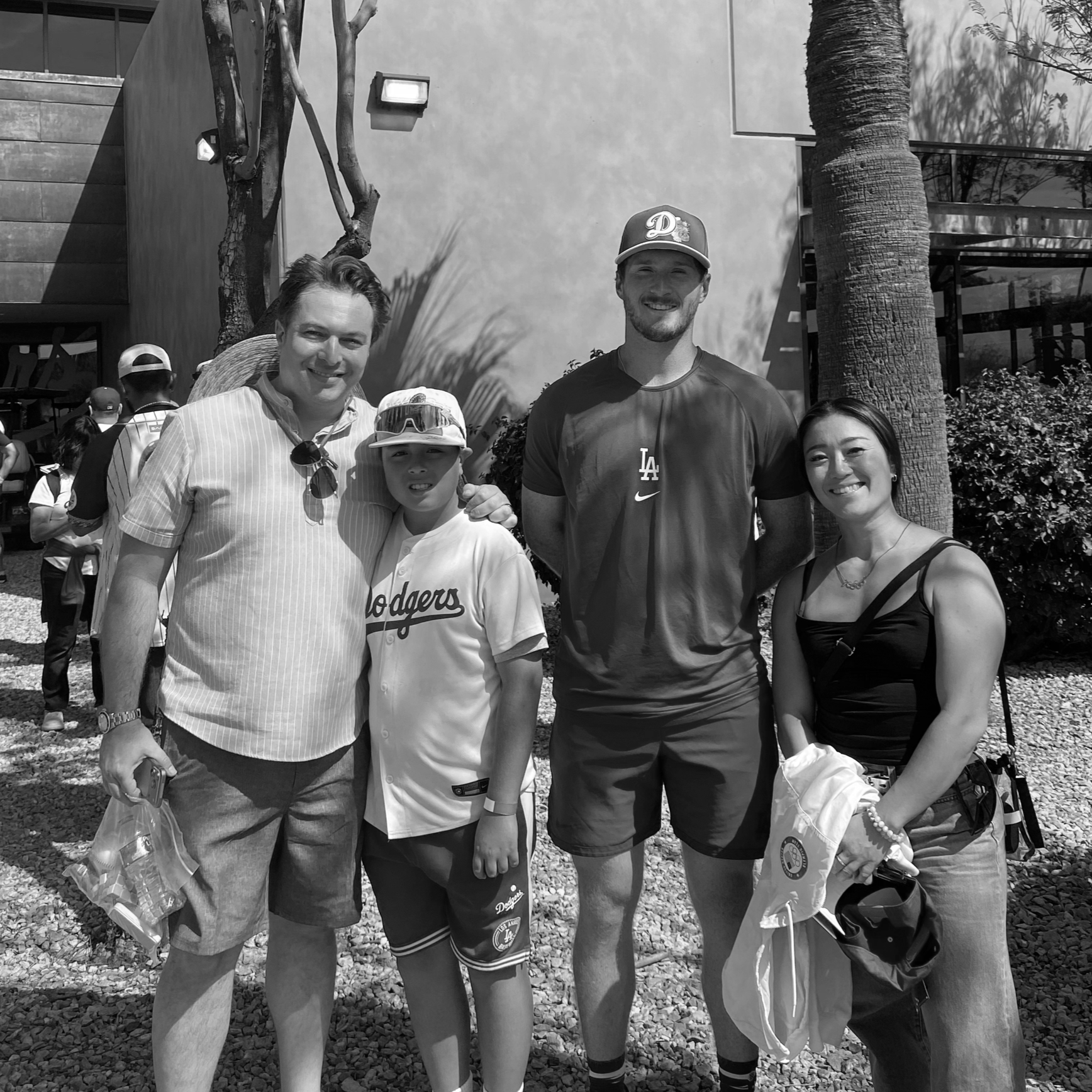 Cam Day, pitcher for the Los Angeles Dodgers, and U.S. Olympian Sakura Kokumai with Jonathan Beutler in Glendale, Arizona.