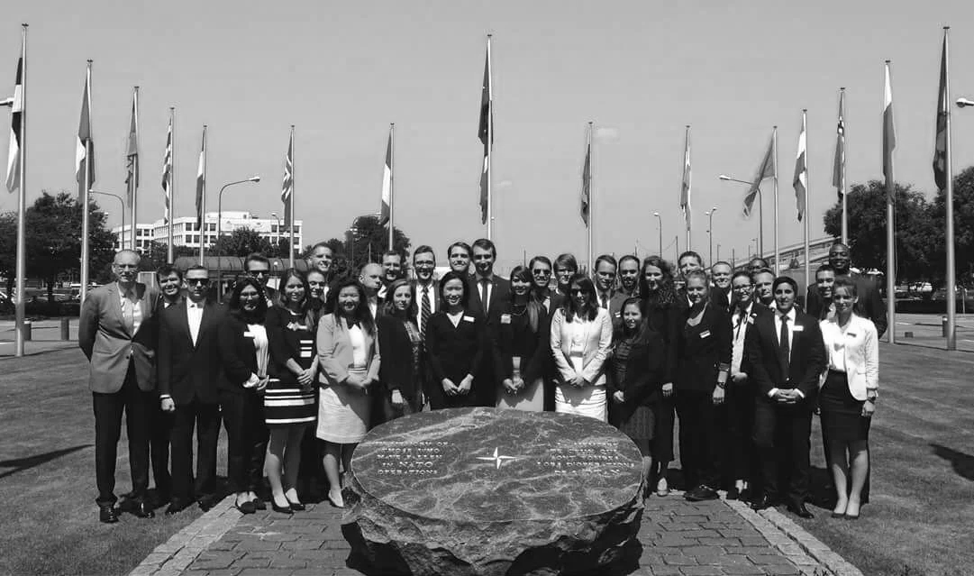 Joint delegation of foreign affairs professionals from the U.S. and Germany during an inspection tour of NATO facilities in Brussels, Belgium.