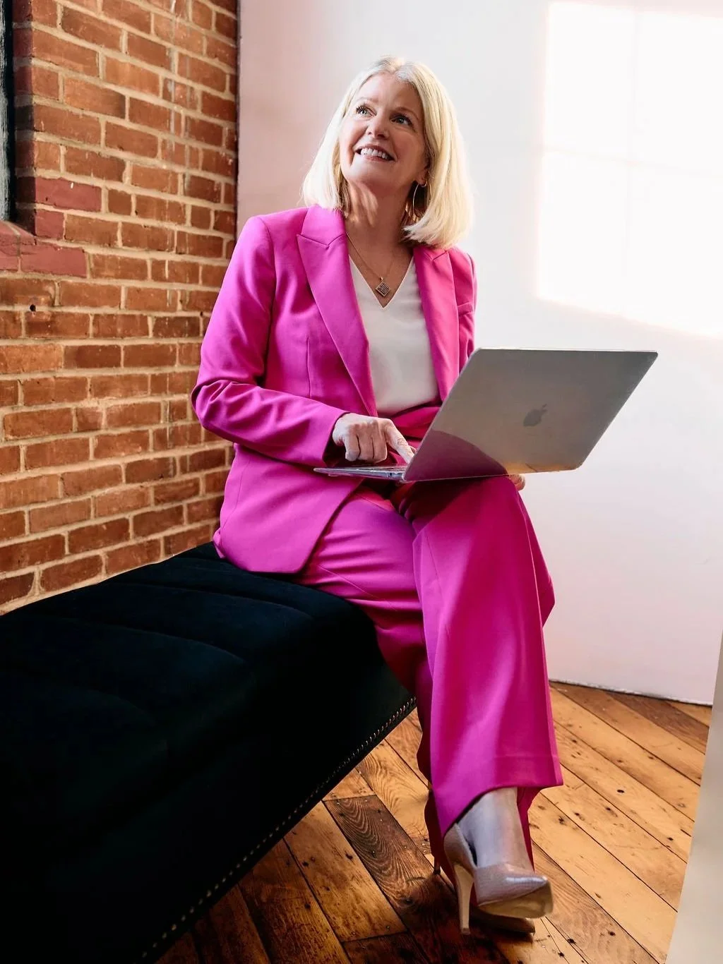 Lisa Axios — contact her to book coaching, speaking, or real estate services