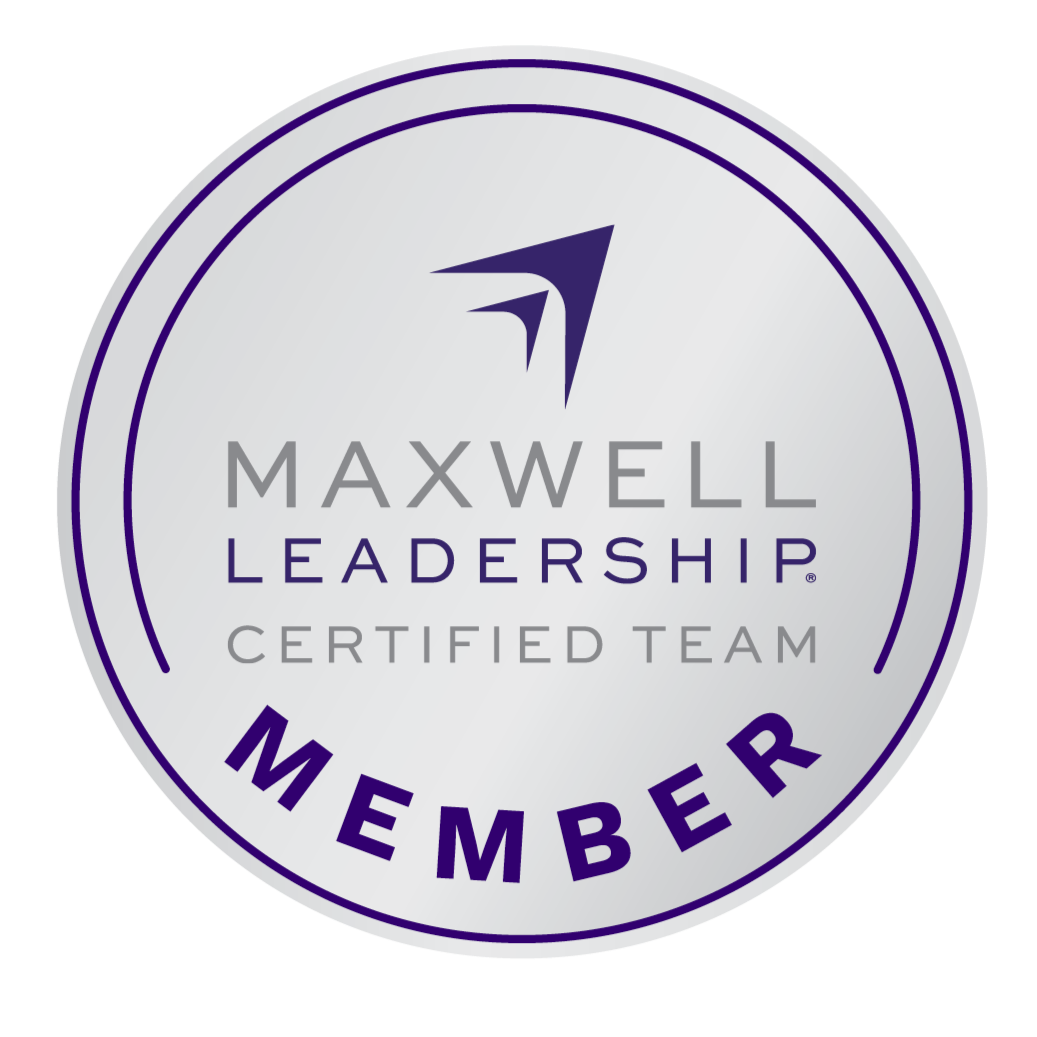 Maxwell Leadership Certified Team Member badge with a stylized logo and purple and gray text on a circular design.