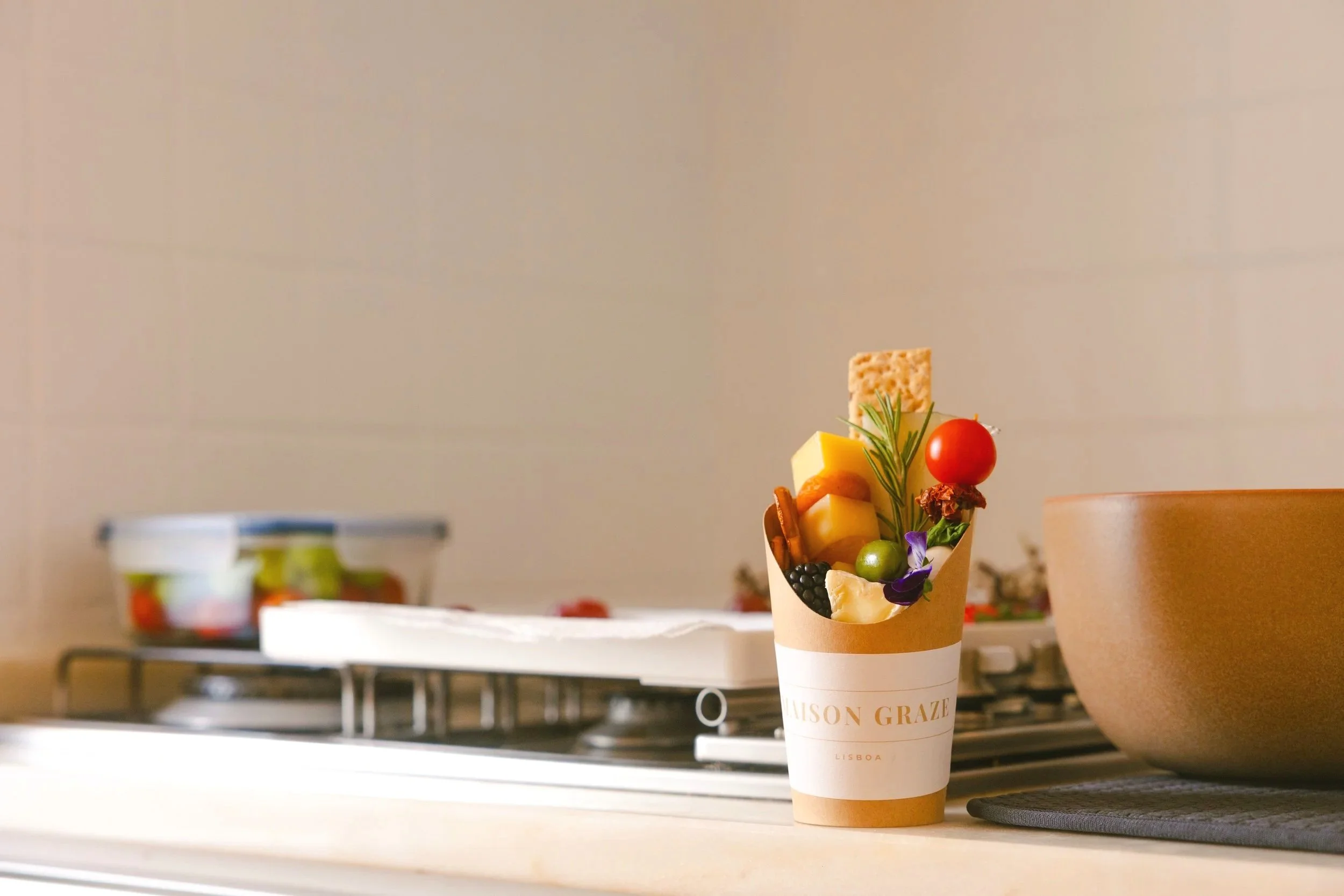 Luxury grazing box arranged with artisan cheeses and seasonal accompaniments