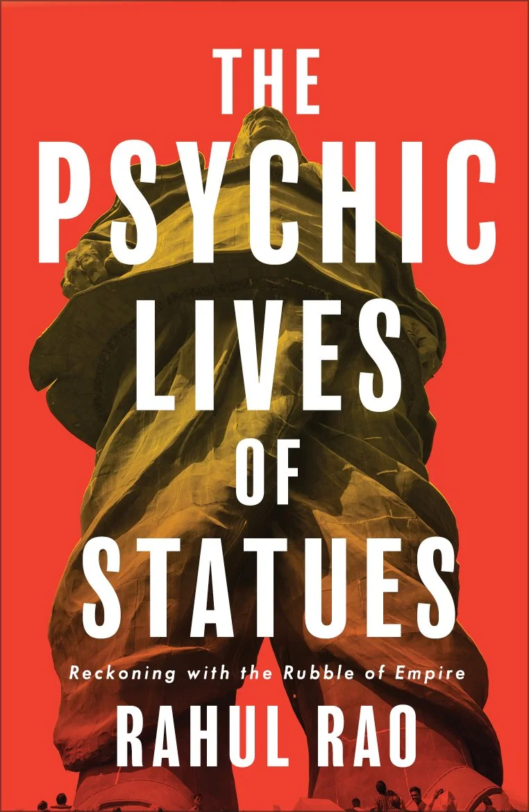 Book cover titled 'The Psychic Lives of Statues' by Rahul Rao, featuring the Statue of Unity in Gujarat, India, viewed from below with a red background.