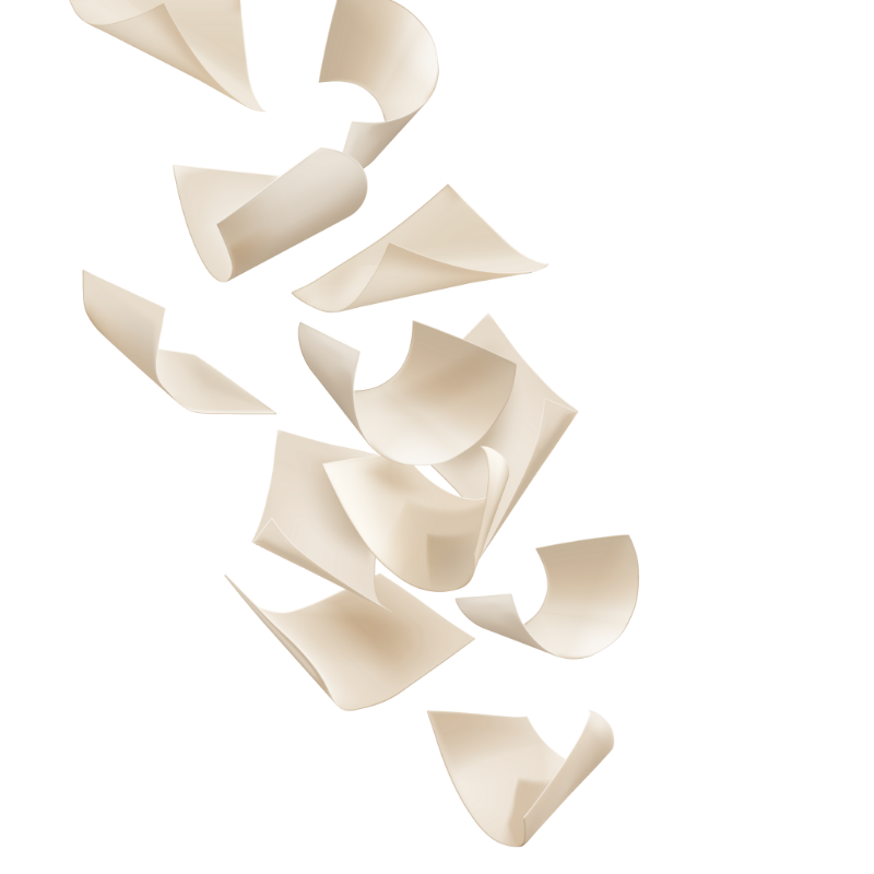 Several white pieces of paper flying through the air.