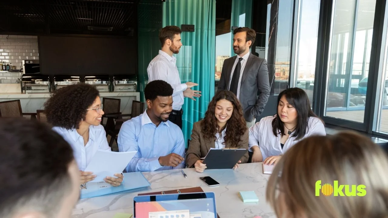Image of professionals demonstrating effective communication and active listening in a modern office.