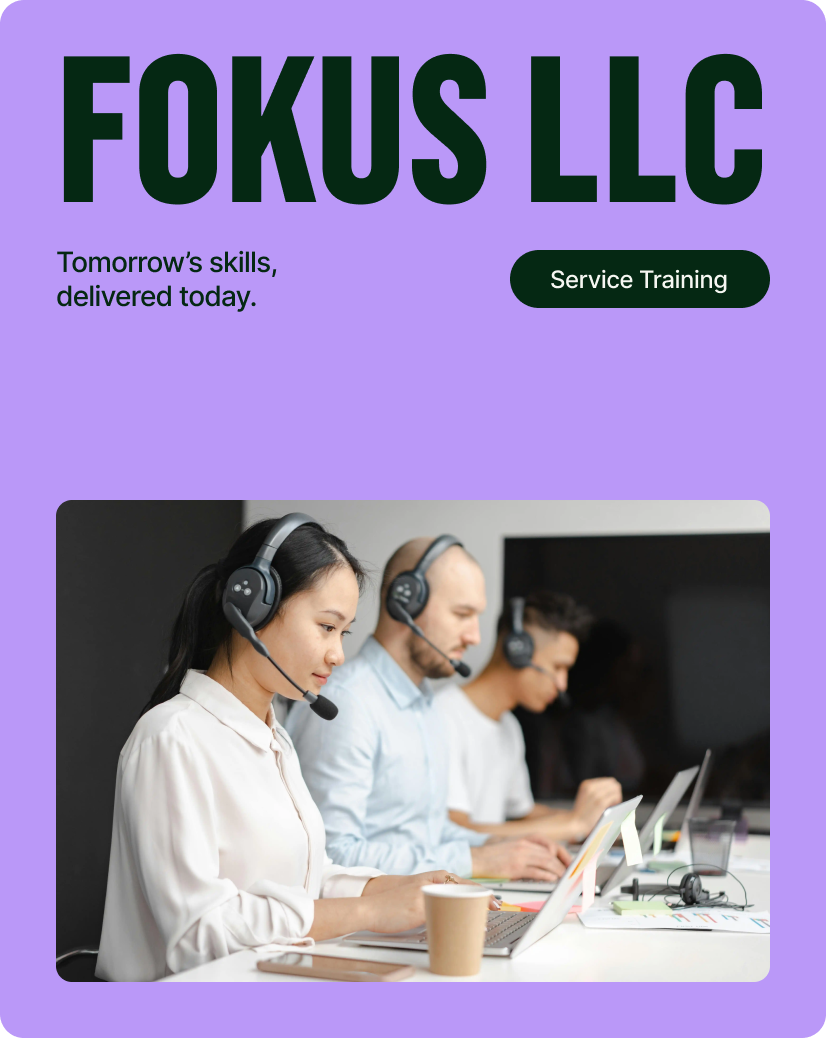 A customer service team working with headsets on in front of laptops.