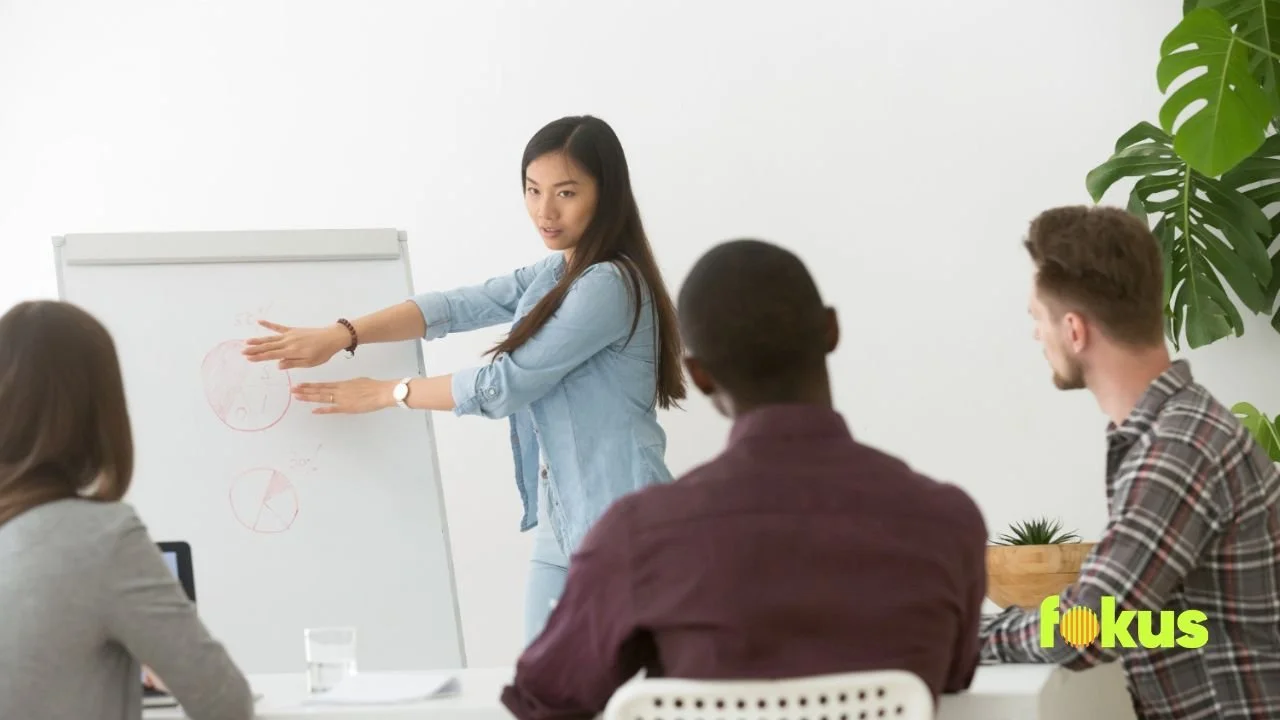 A woman speaks to an audience about the reasons behind the failure of most soft skills training programs.