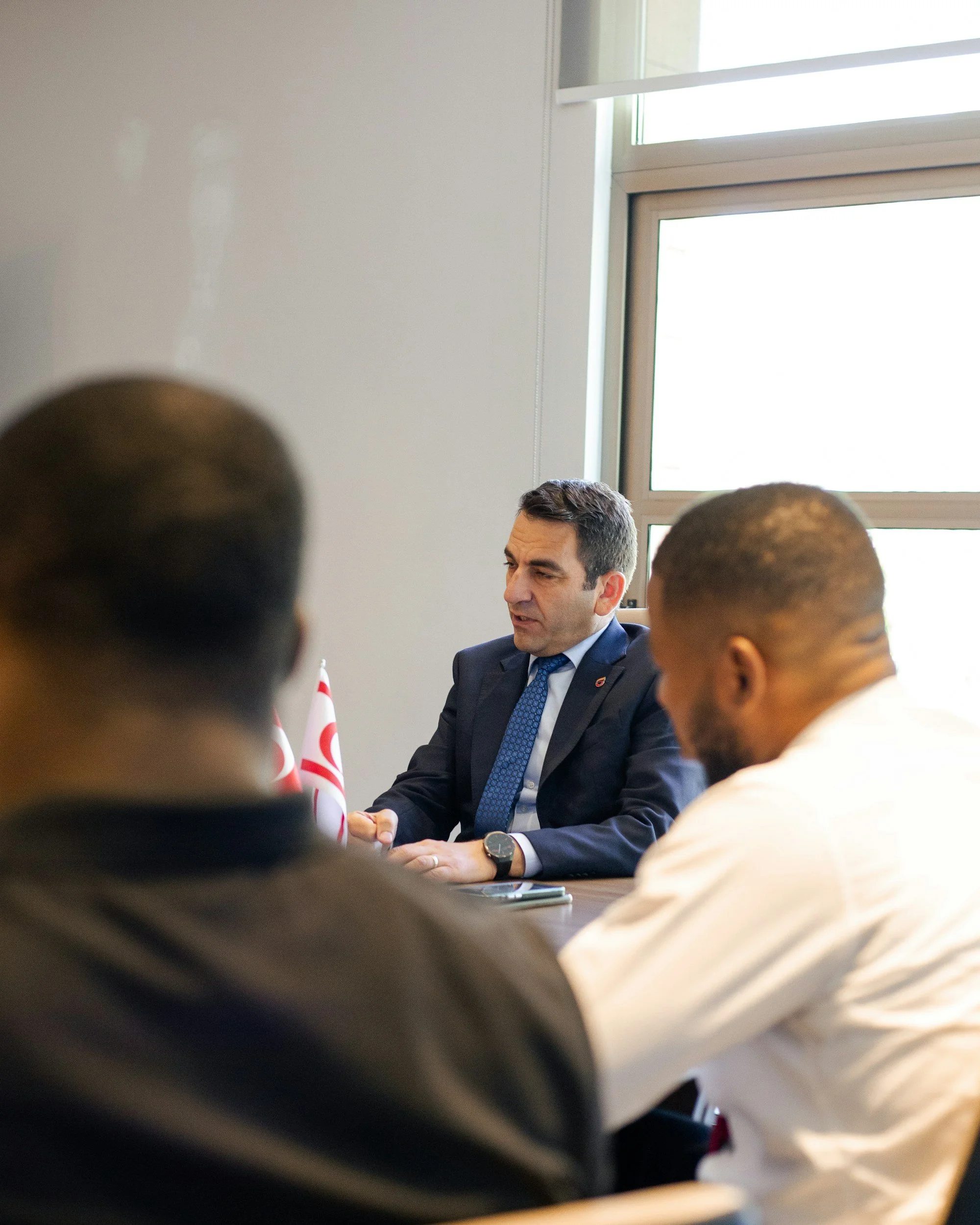 man leading a boardroom meeting