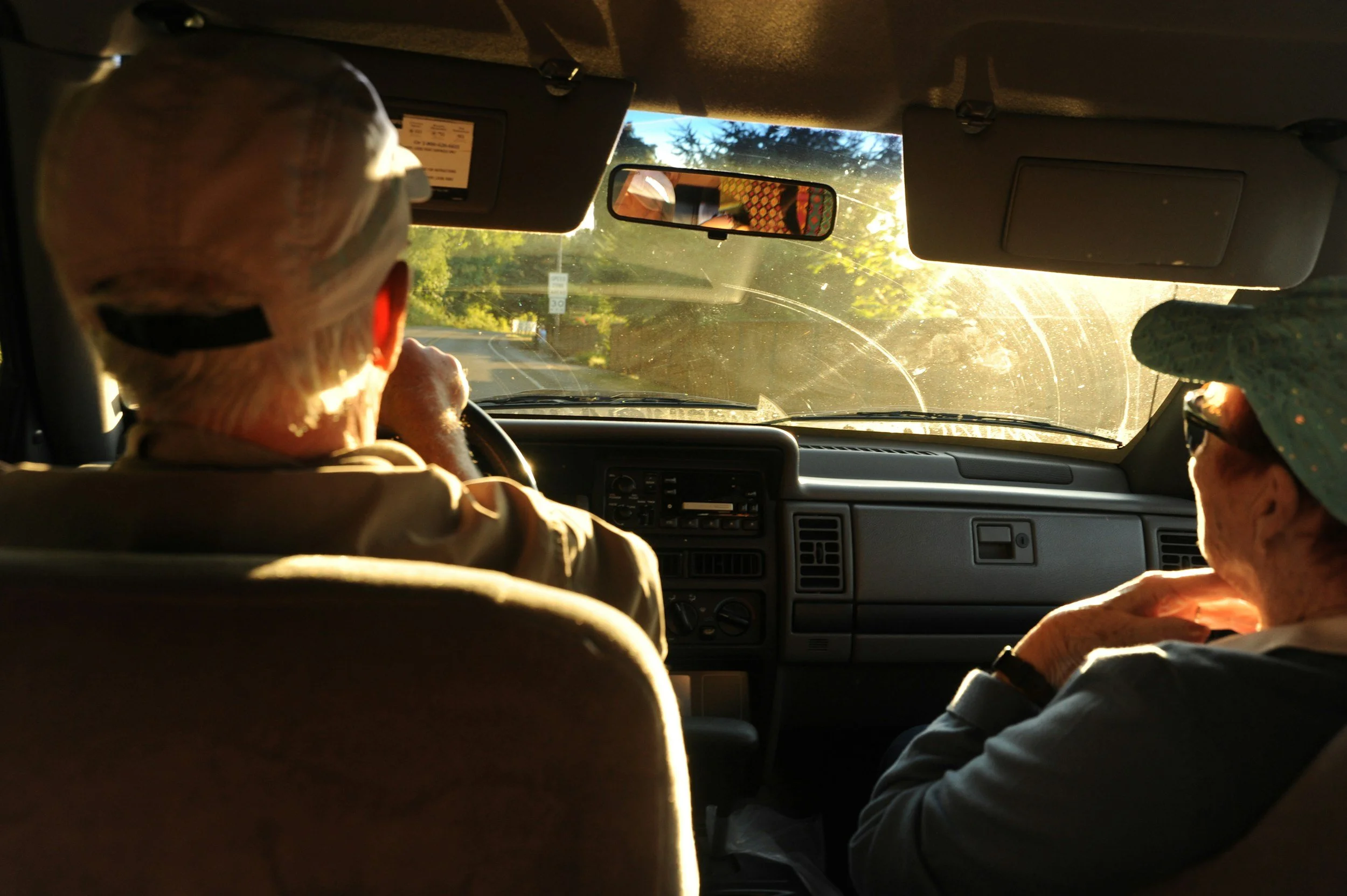 older couple taking a drive in a car