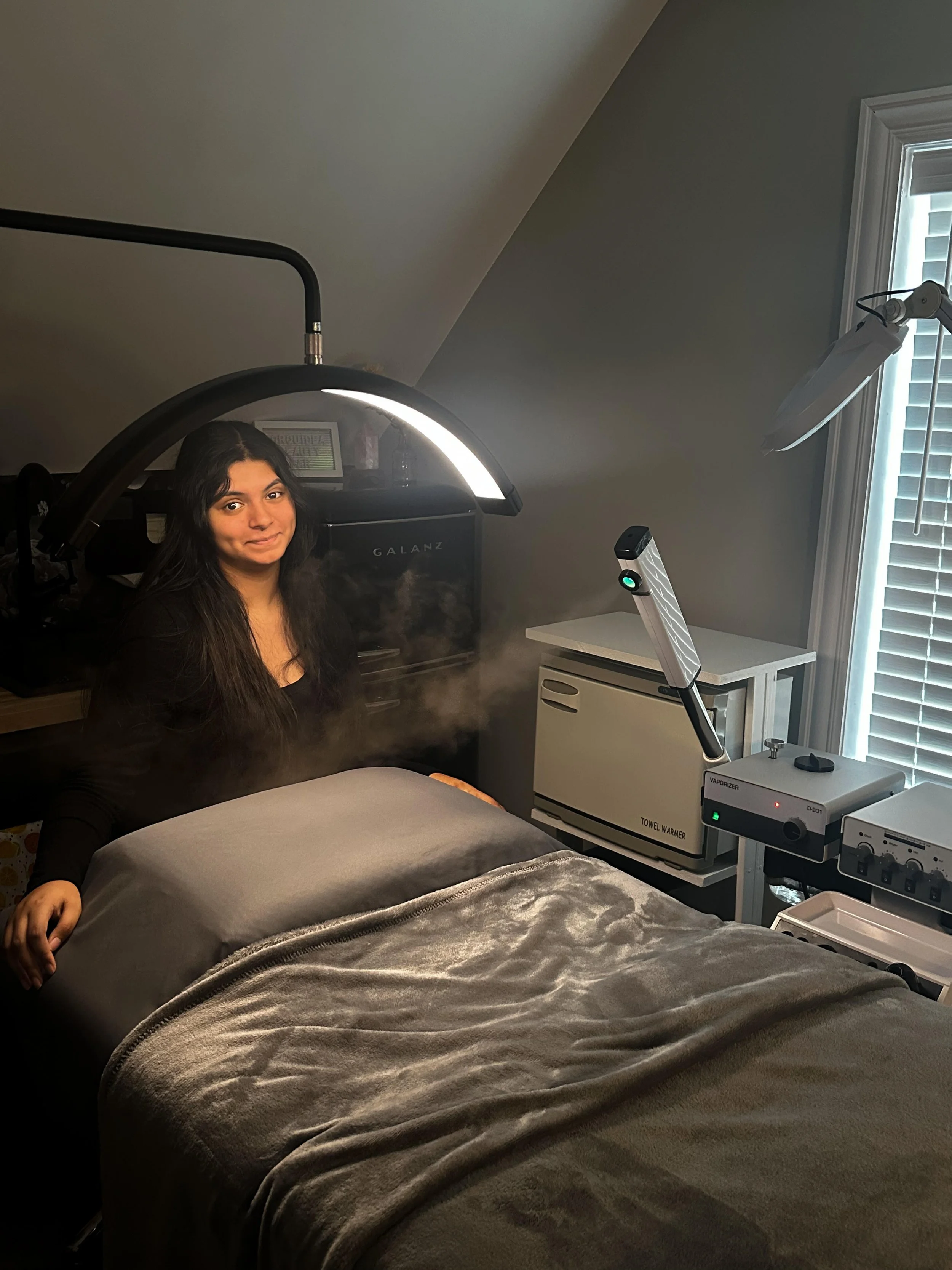 Picture of esthetician in spa room