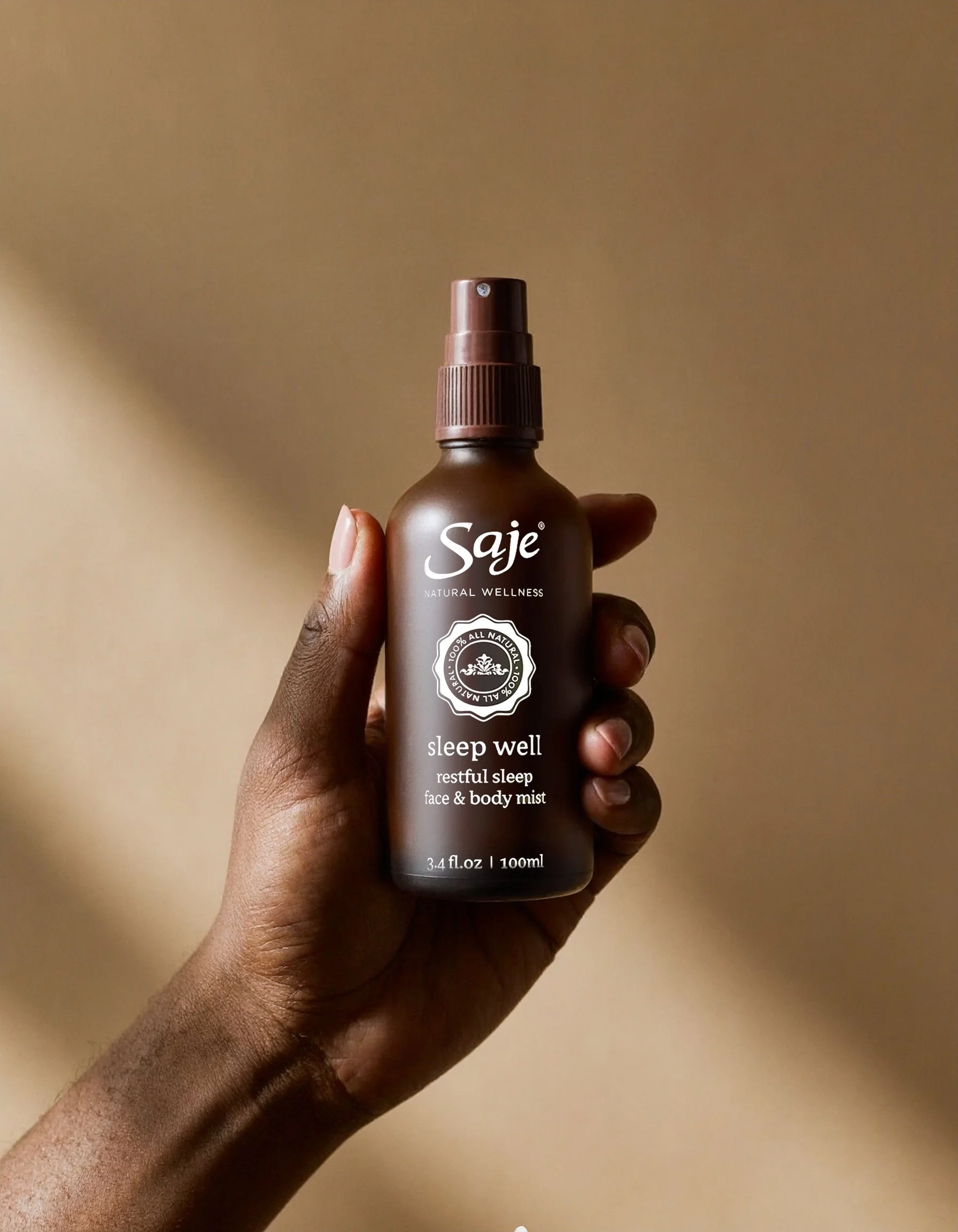 Firefly_hand holding saje bottle 178722.jpg