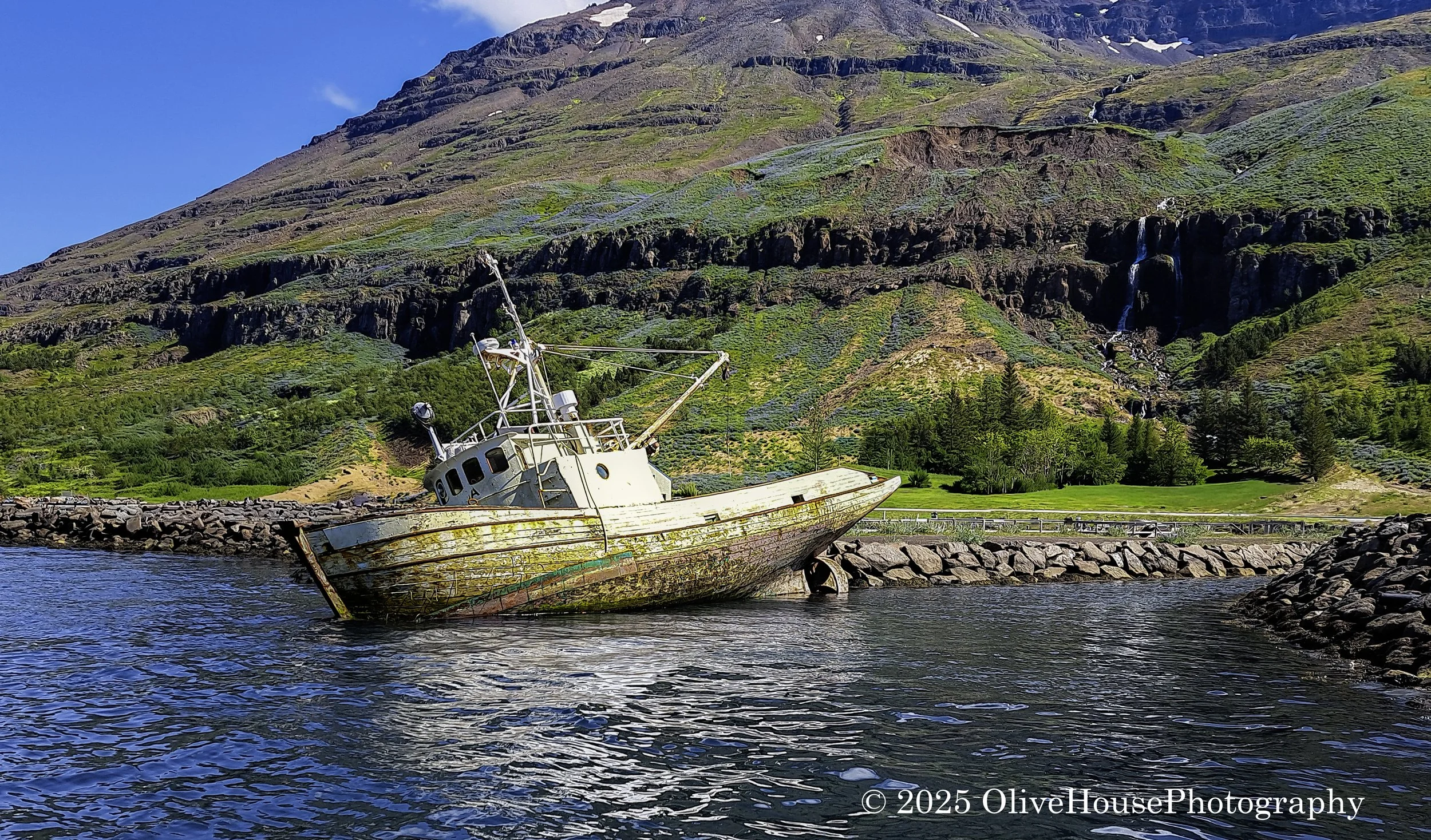 Wrecked fishing boast on Seydisfjordur, Iceland