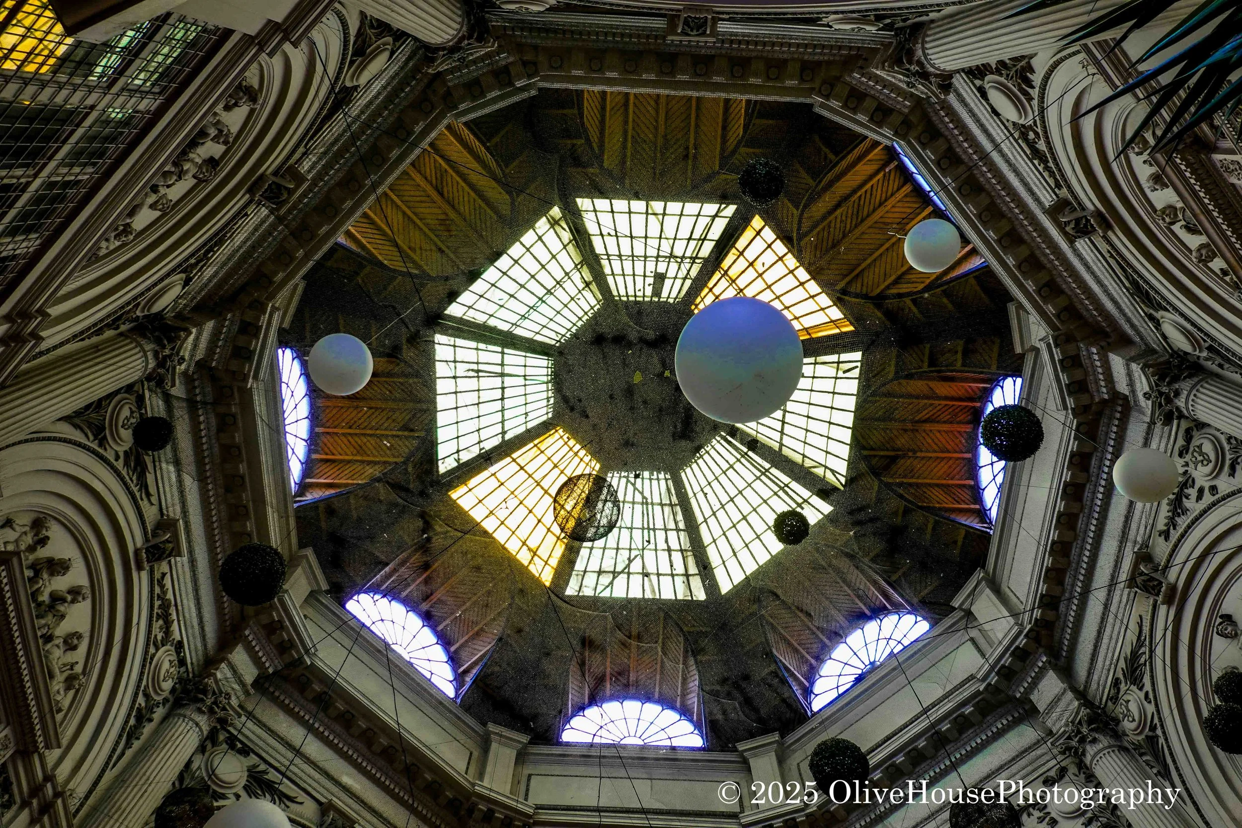Distinctive yellow glass ceiling of the Macca-Villacrosse Passage in Bucharest, Romania. 
