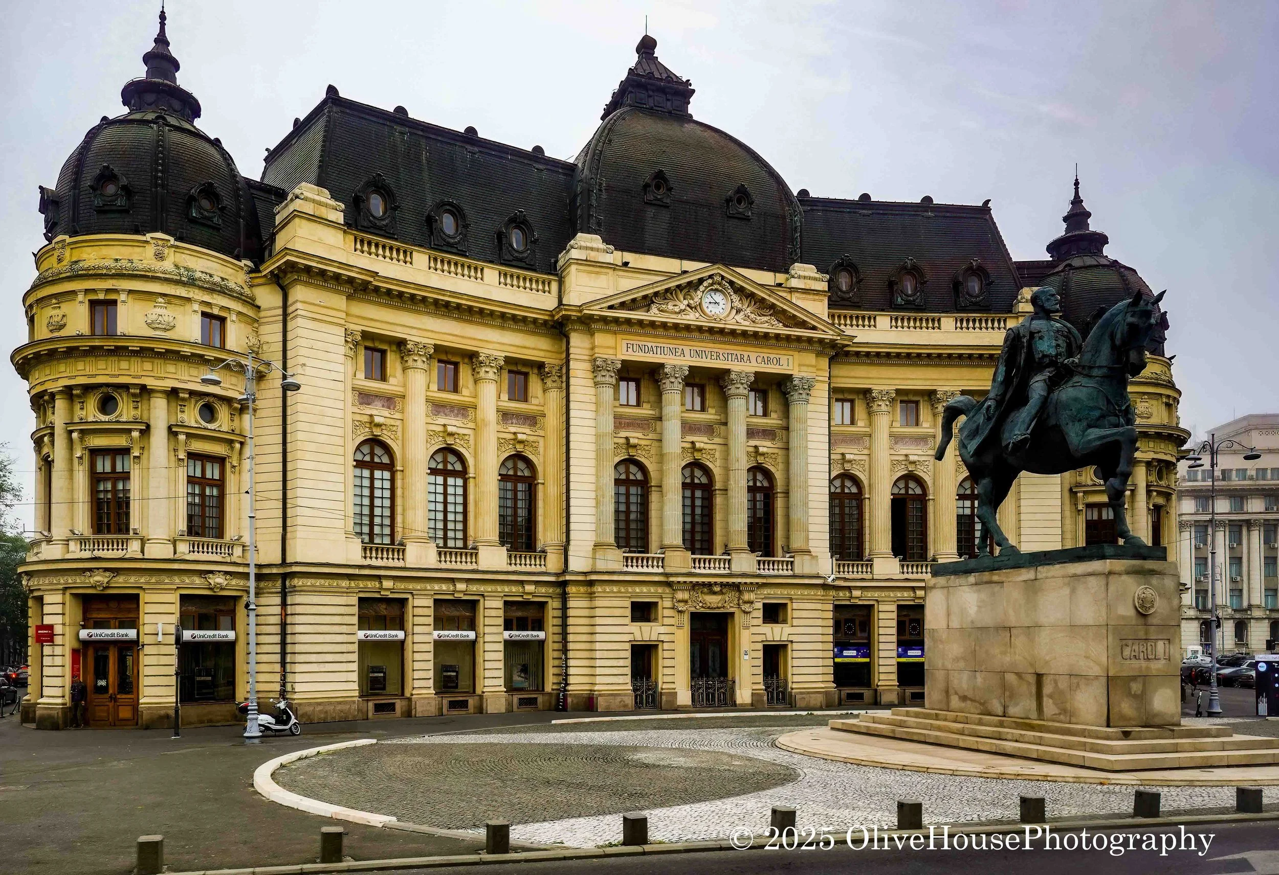 Carol I Central University Library and the equestrian statue of King Carol I in Bucharest, Romania. 