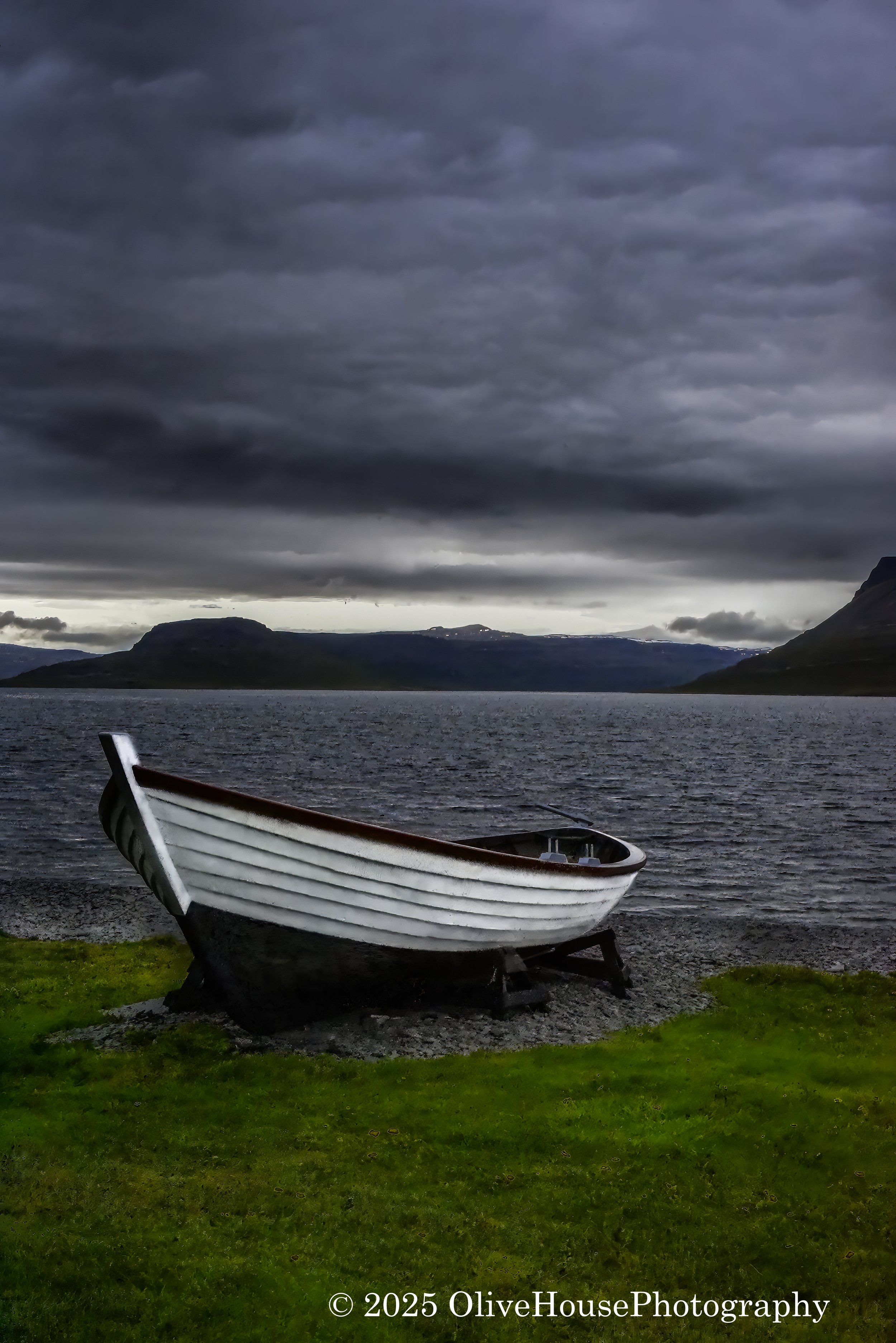 Boat on shore of Bird Island, Isafjordur, Iceland