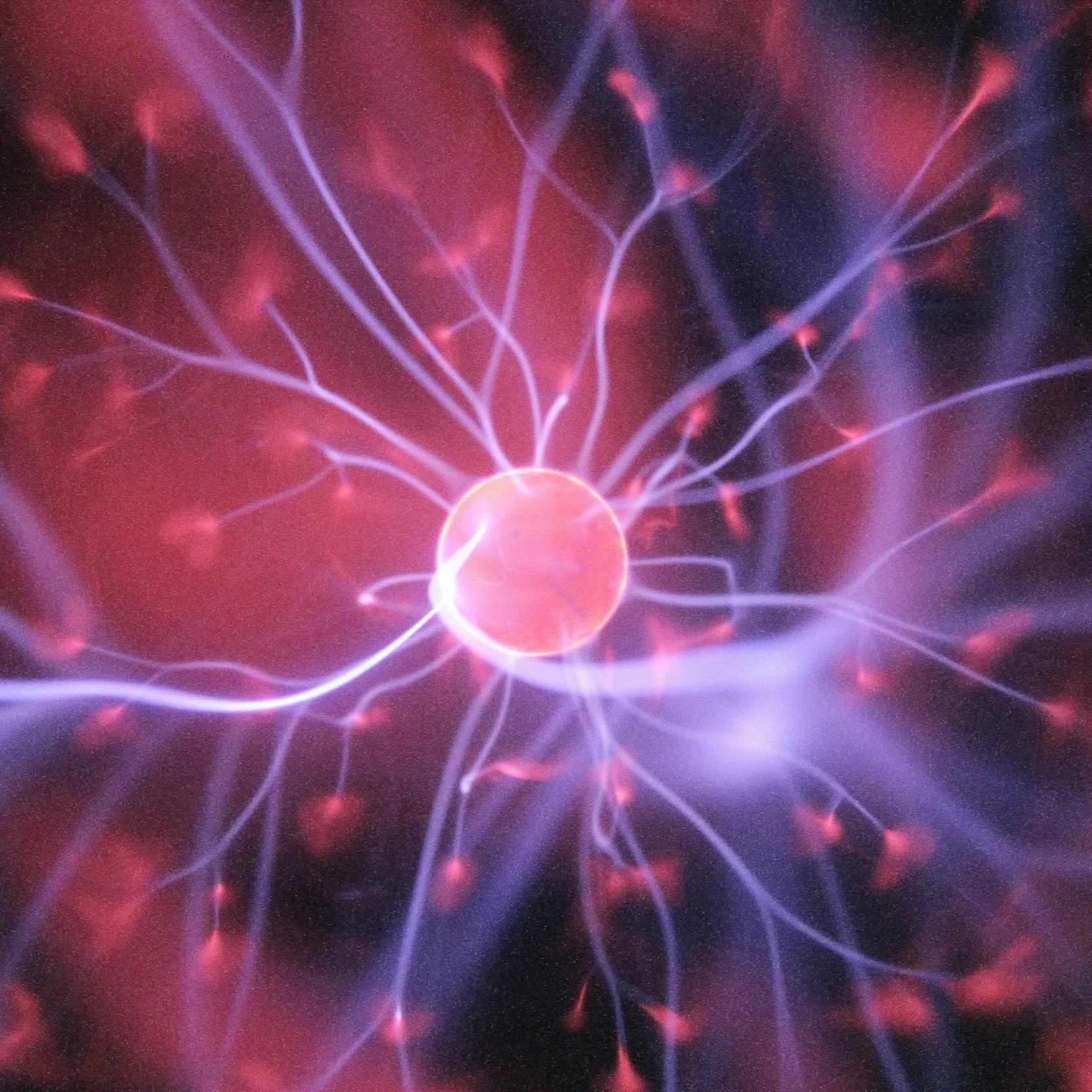 A digital visualization of a plasma globe showing electric filaments extending from a central sphere into dark space.