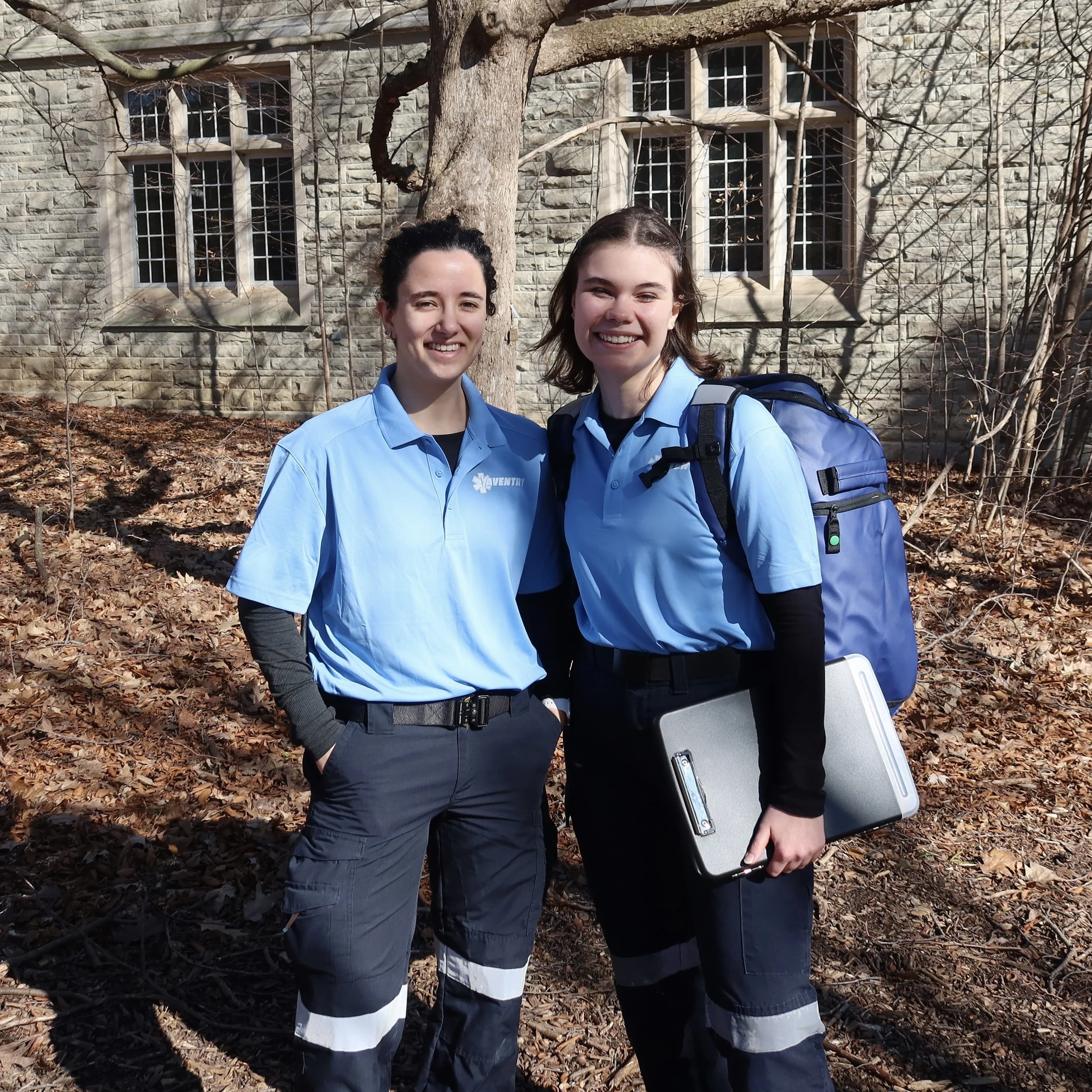 Two female Aventry Medical medics standing together smiling